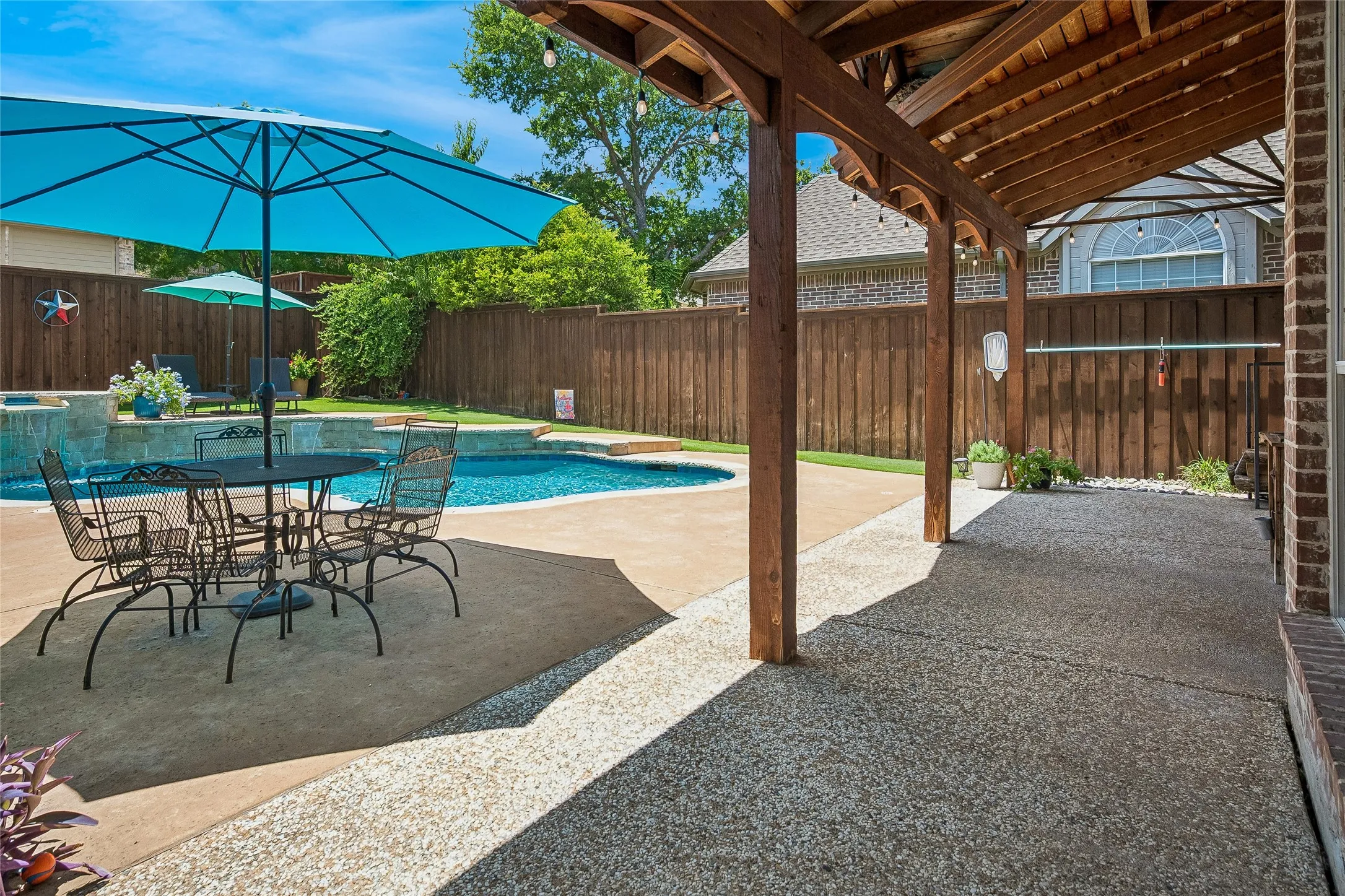 Attractive long covered patio.