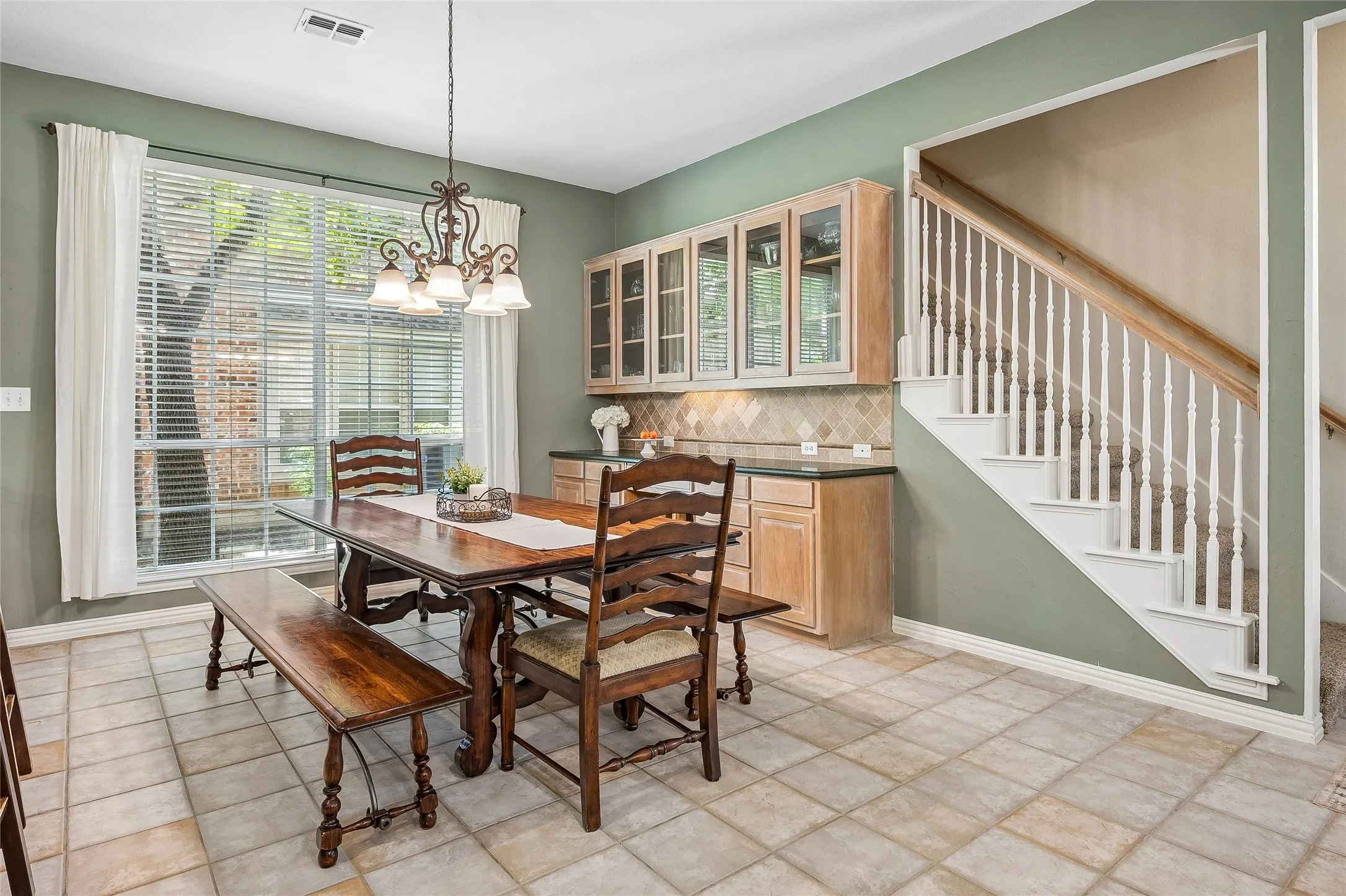 Double staircase makes easy access to upstairs. Generous built-ins for plenty of storage.