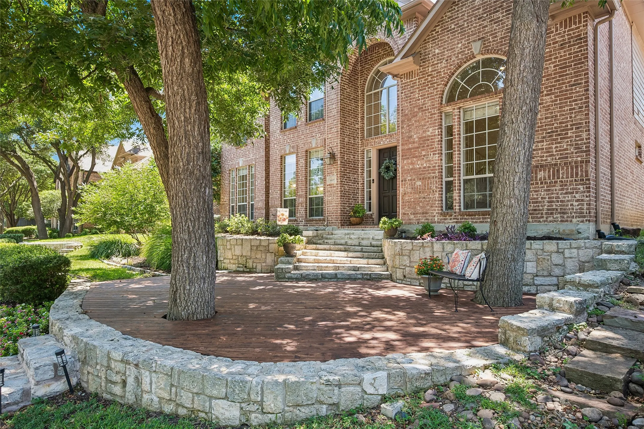 Every attention to detail, deck, stone work, graceful steps.