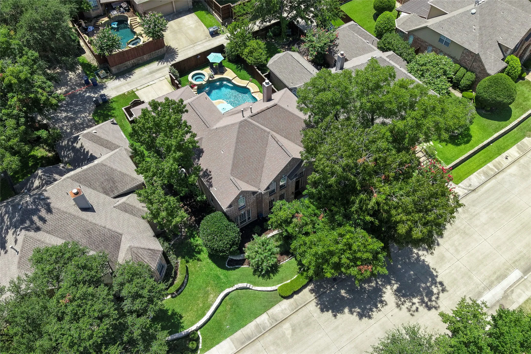 Beautiful trees and greenery enhance this perfect setting.