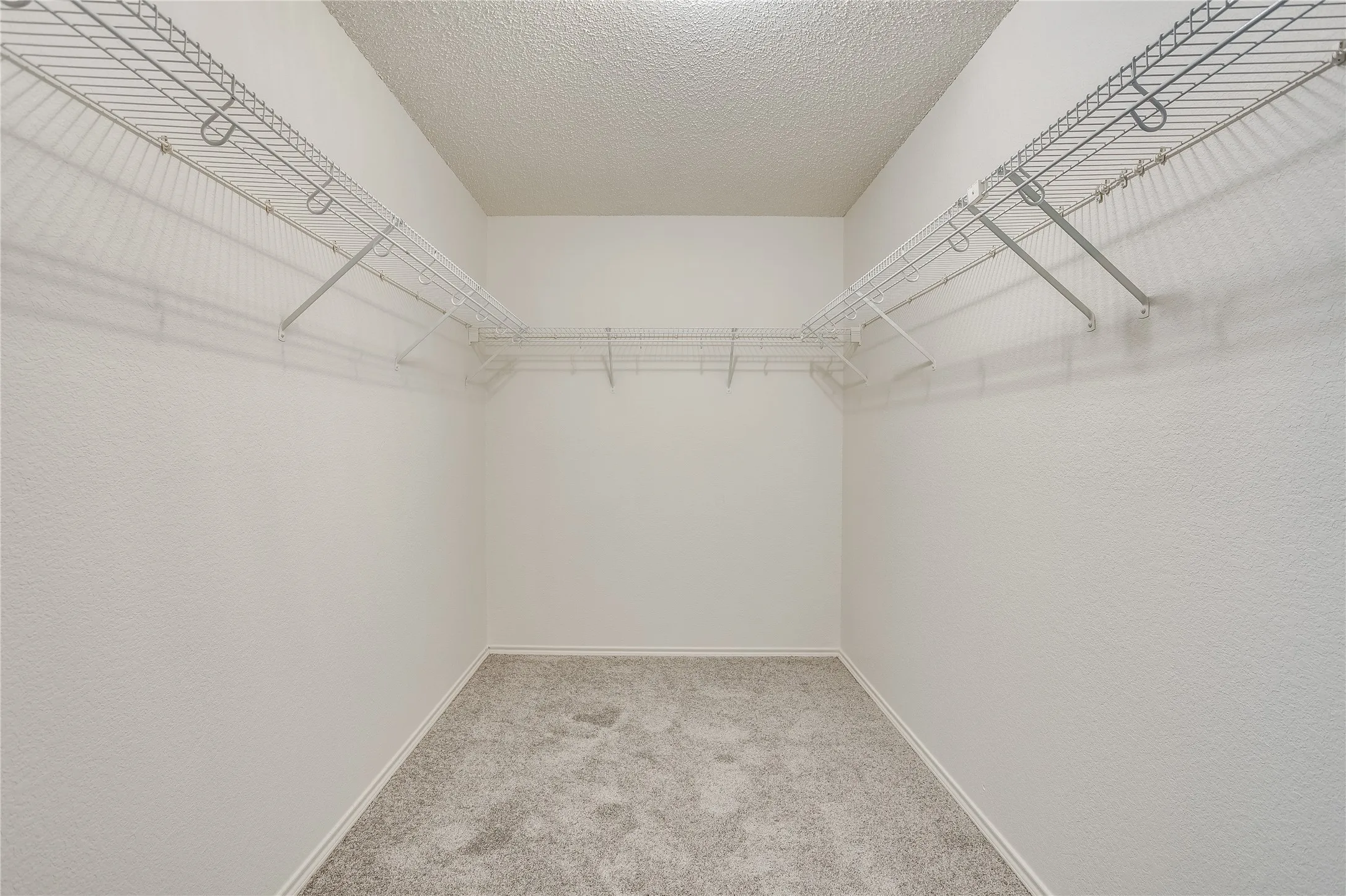 Huge walking primary closet.