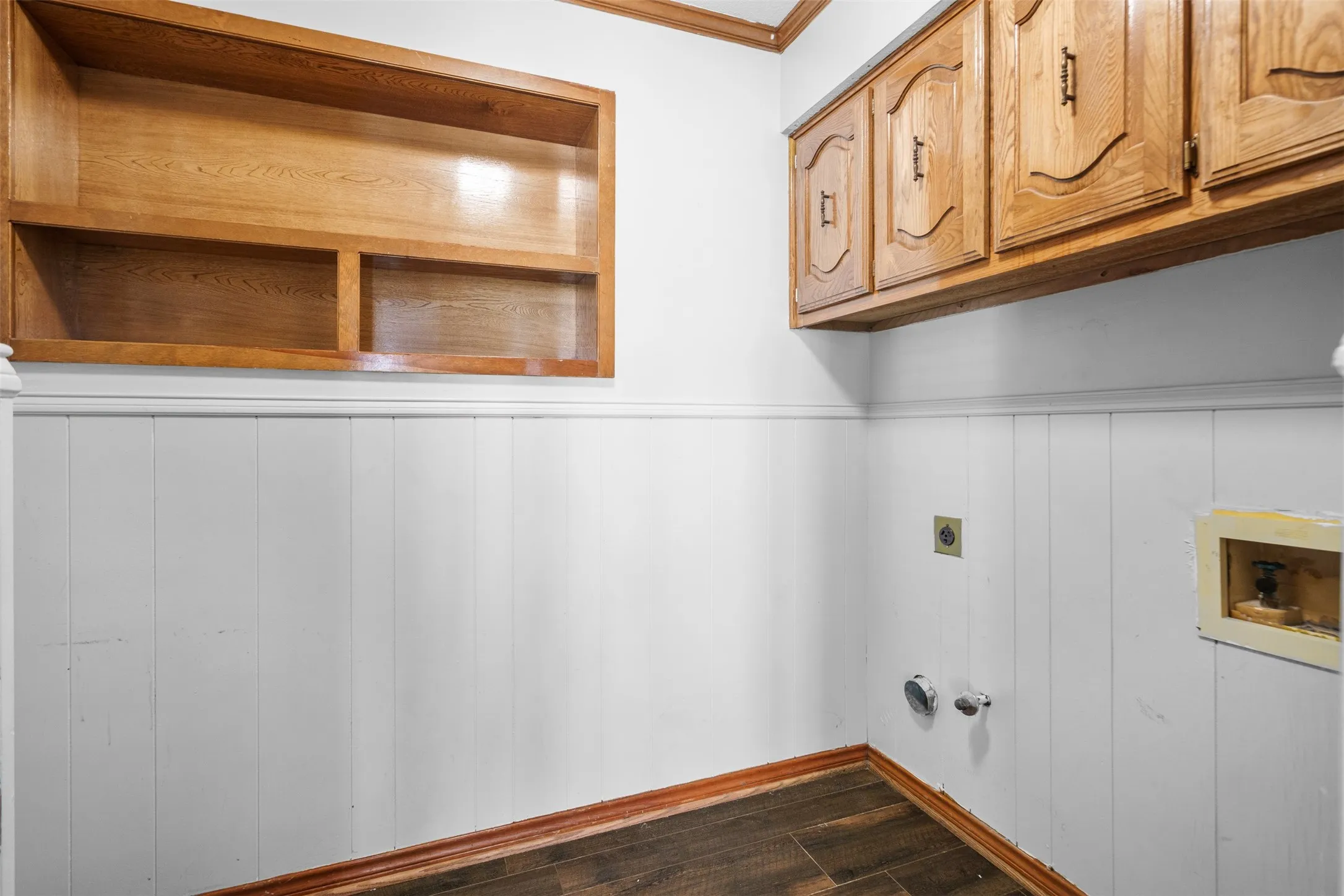 Laundry room with lots of built in storage
