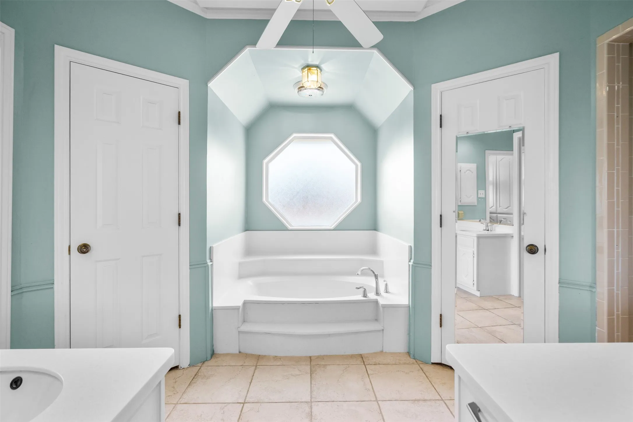 Primary bathroom with lots of natural light