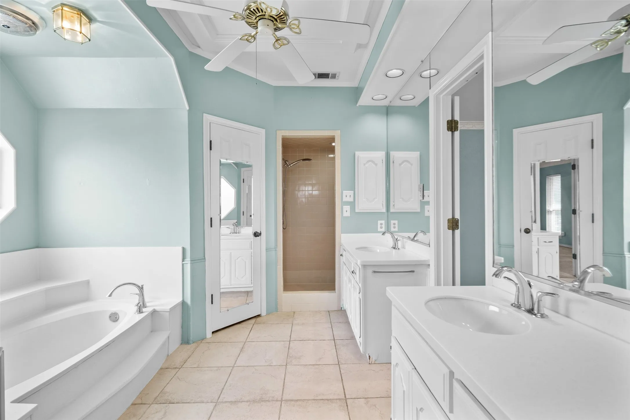 Primary bathroom with lots of natural light