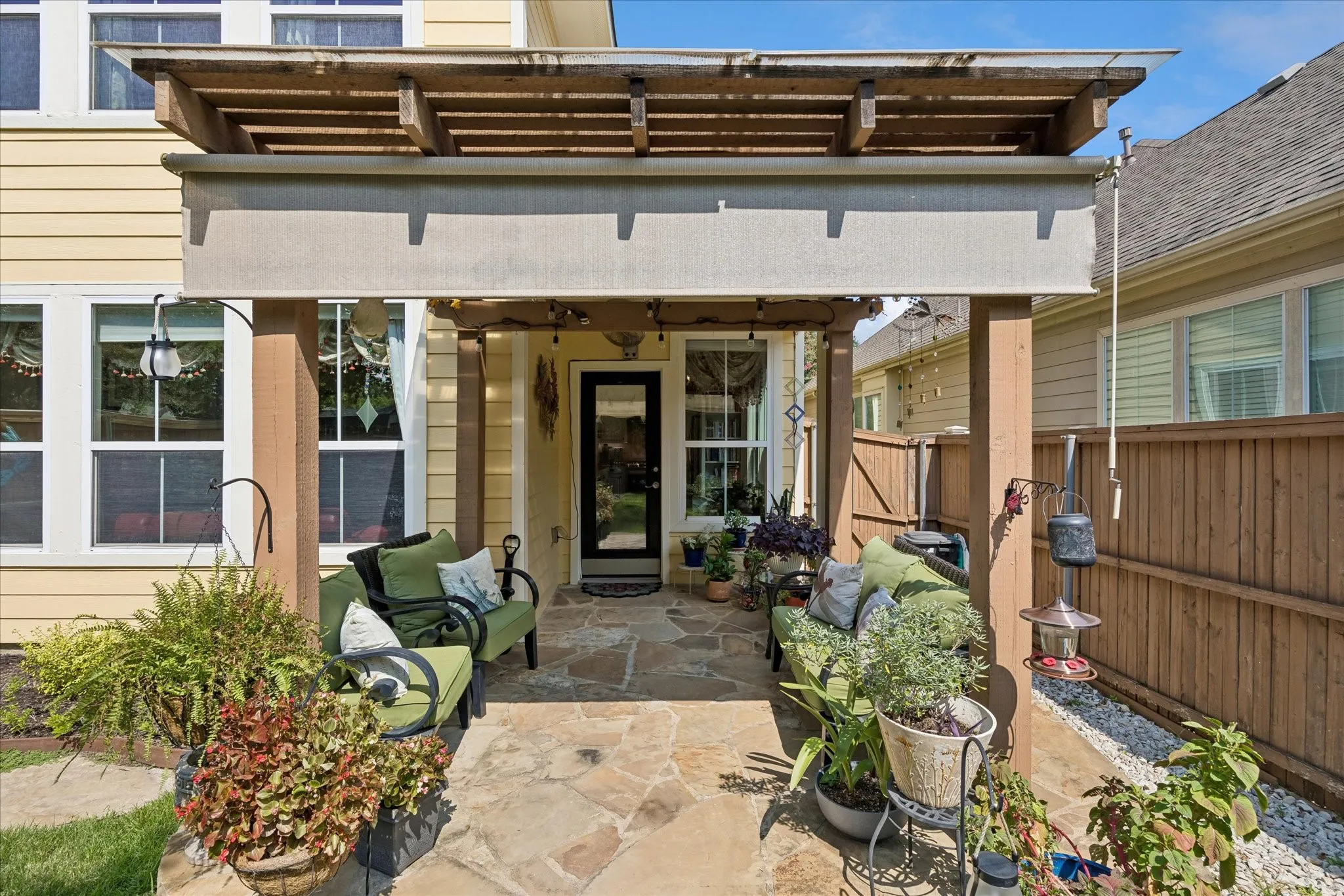 Lovely patio with awning to help with the Texas Sun.