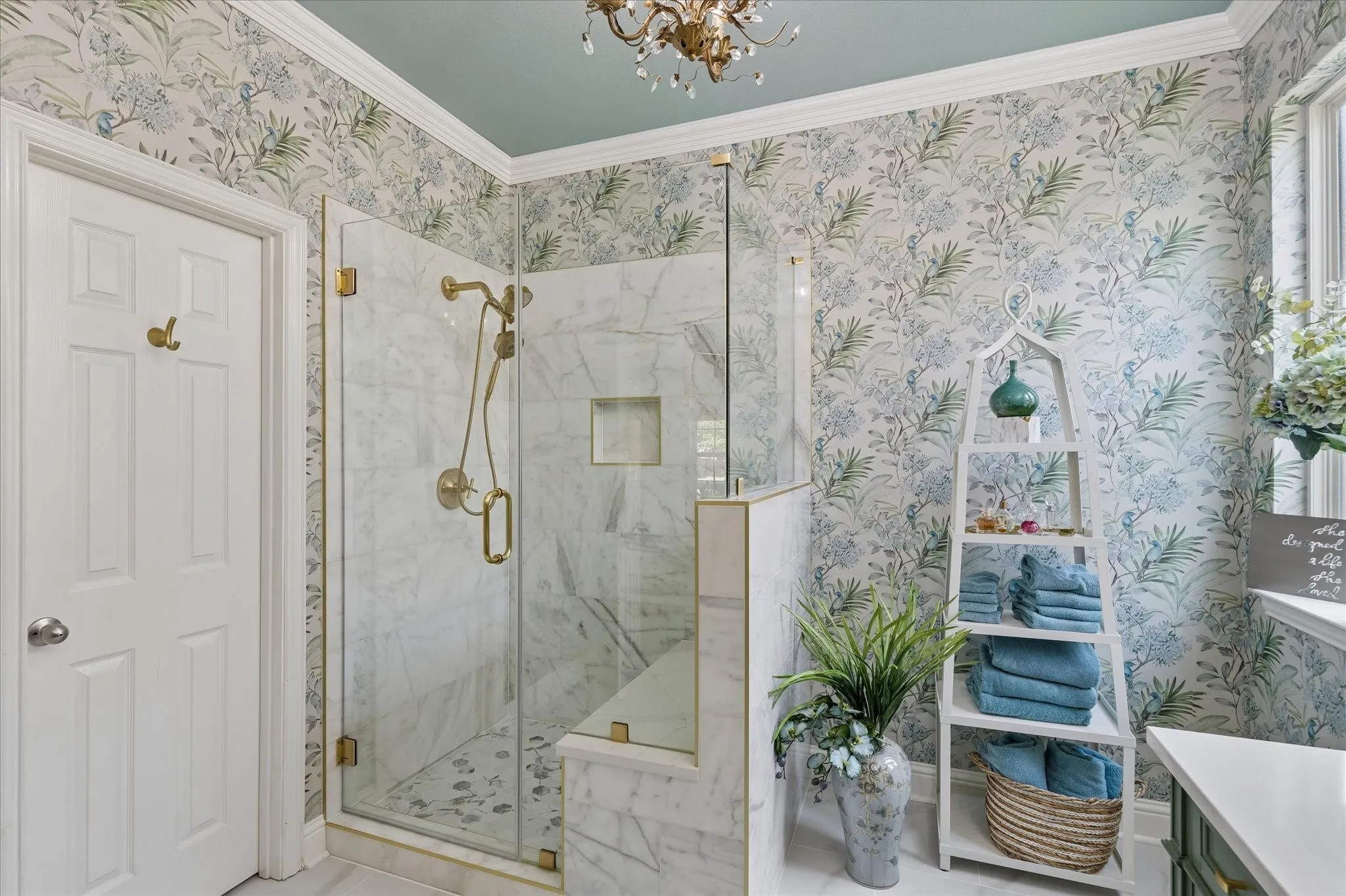 Ensuite bathroom with private throne area and large shower.