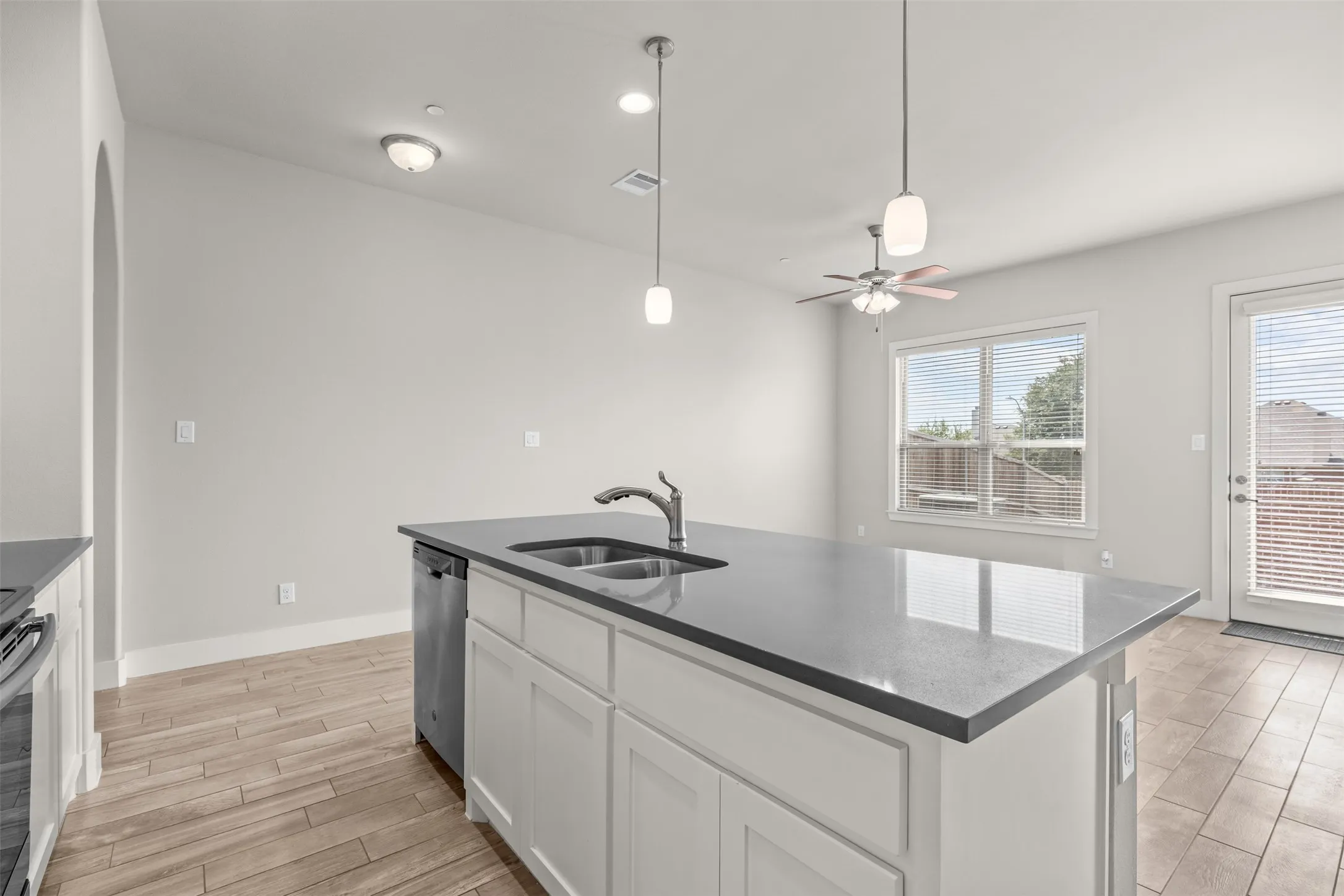 Island features storage and electric outlets