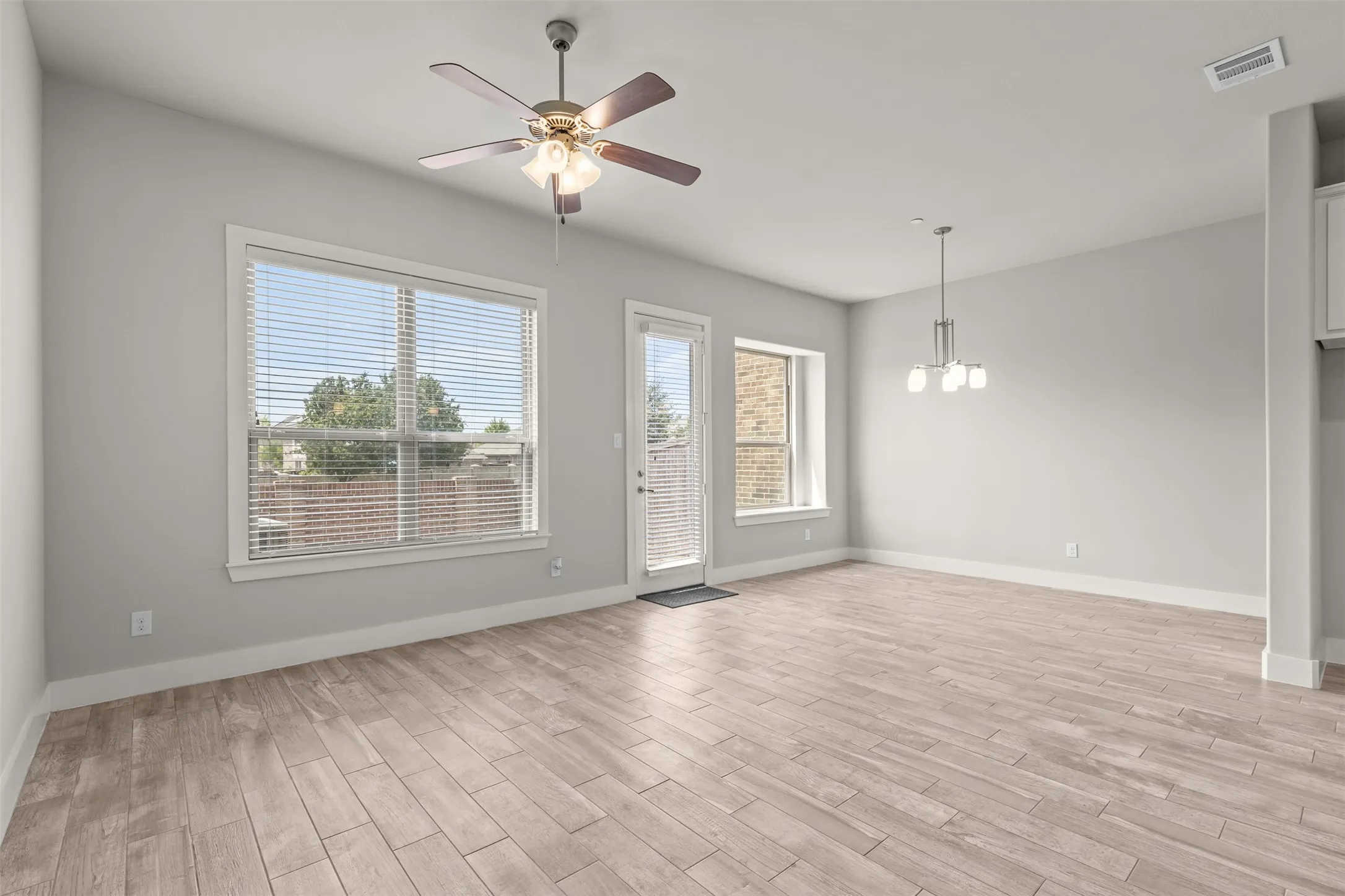 Large windows provide lots of natural light and views of the backyard