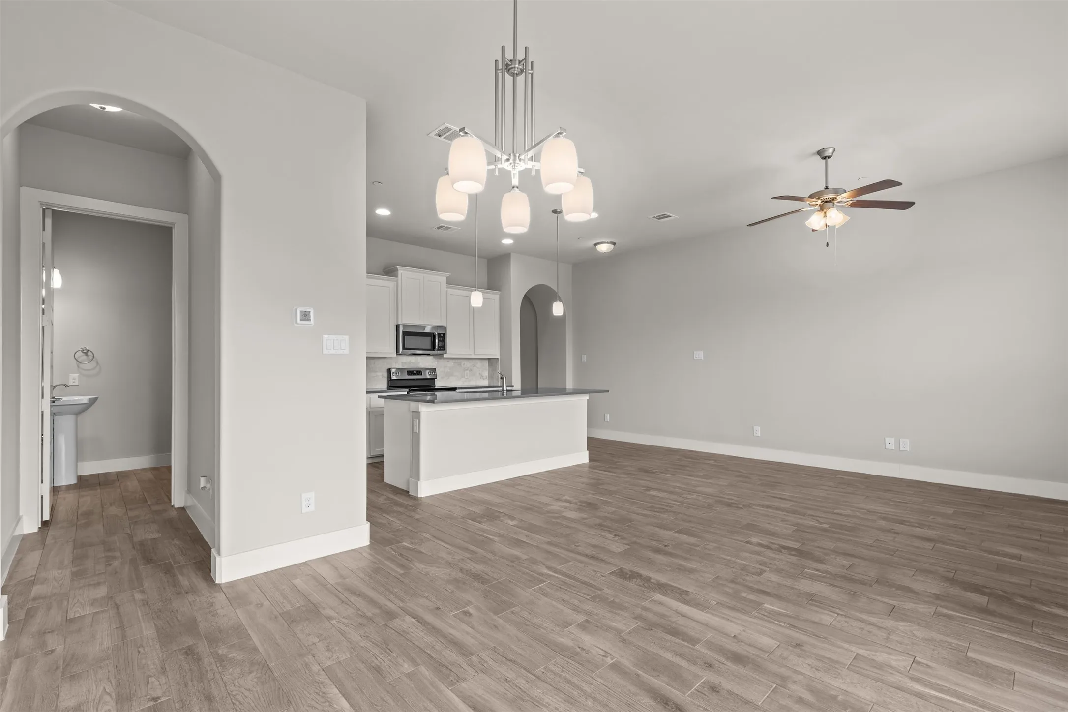 First floor guest powder room is down the hall