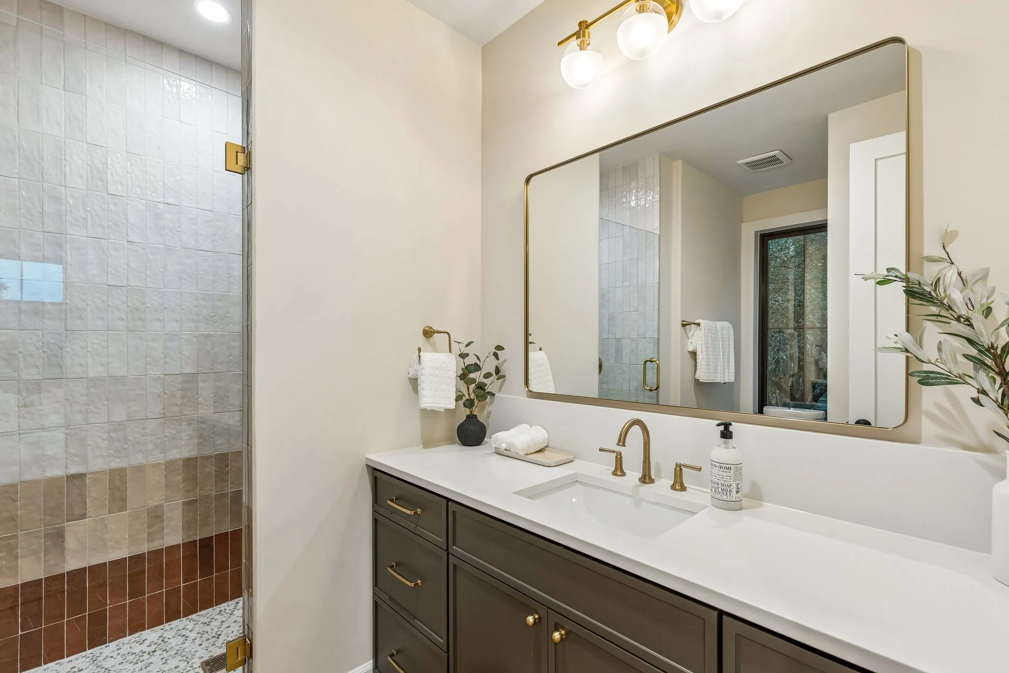 Upstairs ensuite bathroom with large shower