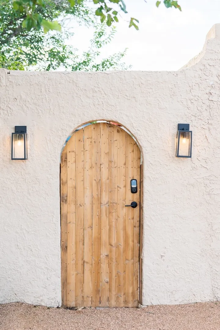 Arched doorway to backyard area