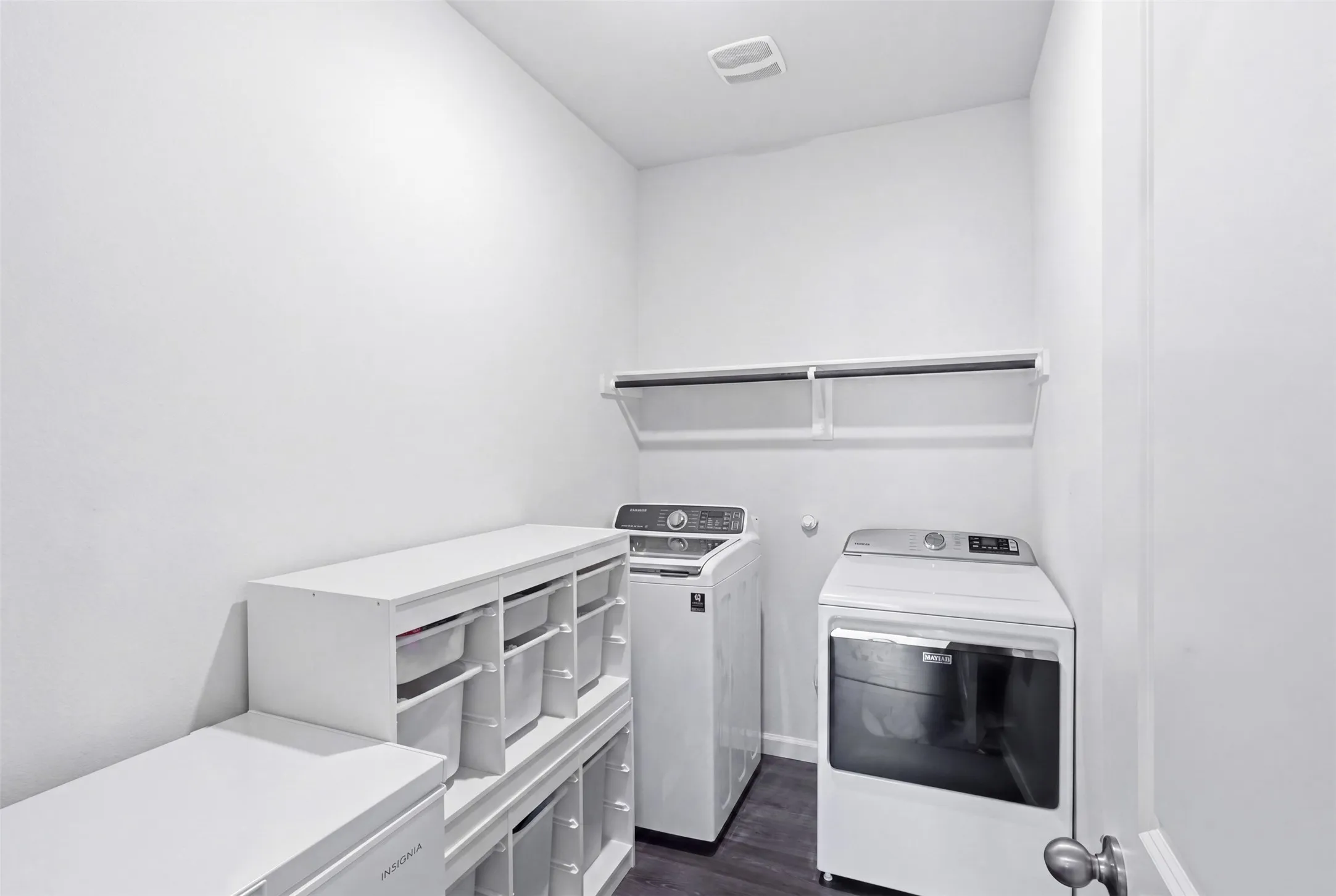 Large laundry room with space for a extra fridge or freezer