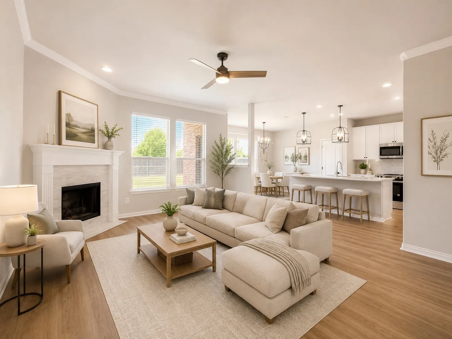 Open-concept living area featuring wood-finish flooring, recessed lighting, and crown molding throughout