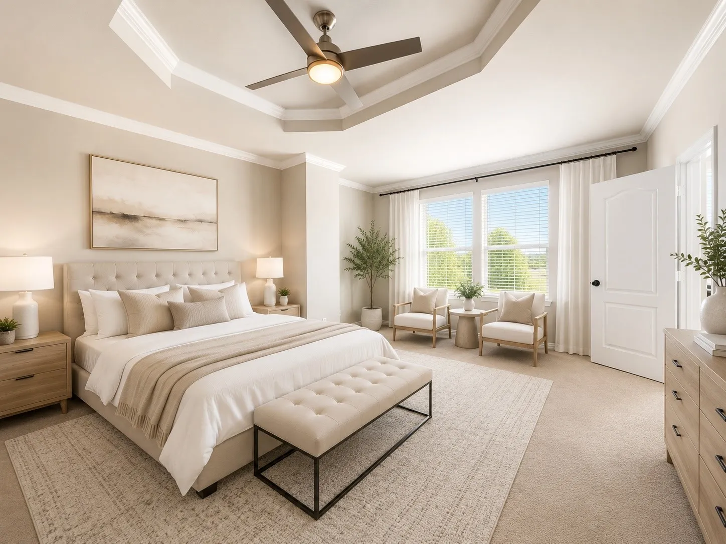 Tray ceiling with crown molding and a contemporary ceiling fan