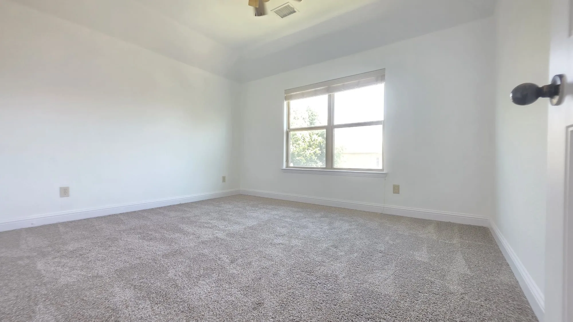 Bedroom 4 with backyard view