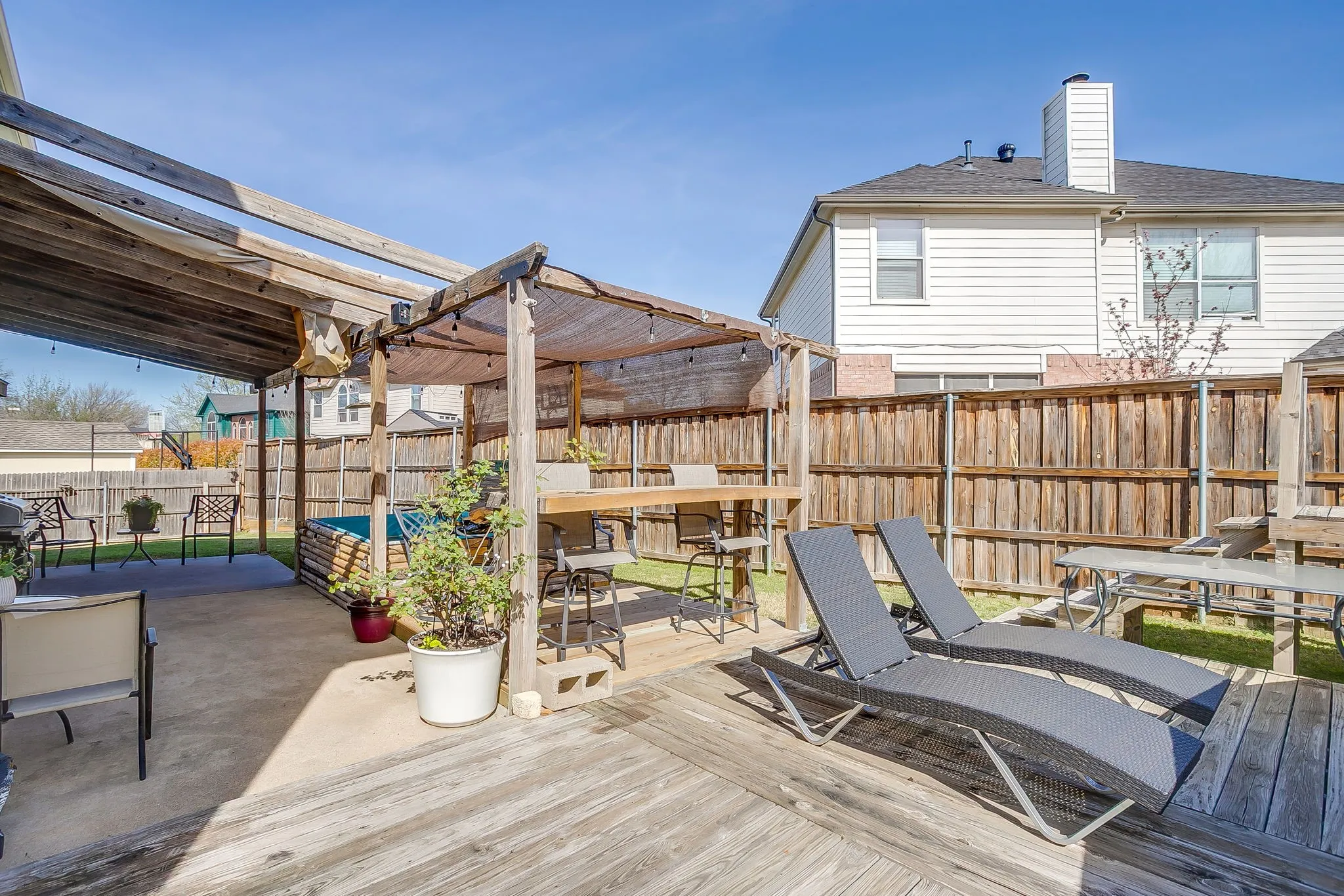 The backyard is a great space to entertain family and friends