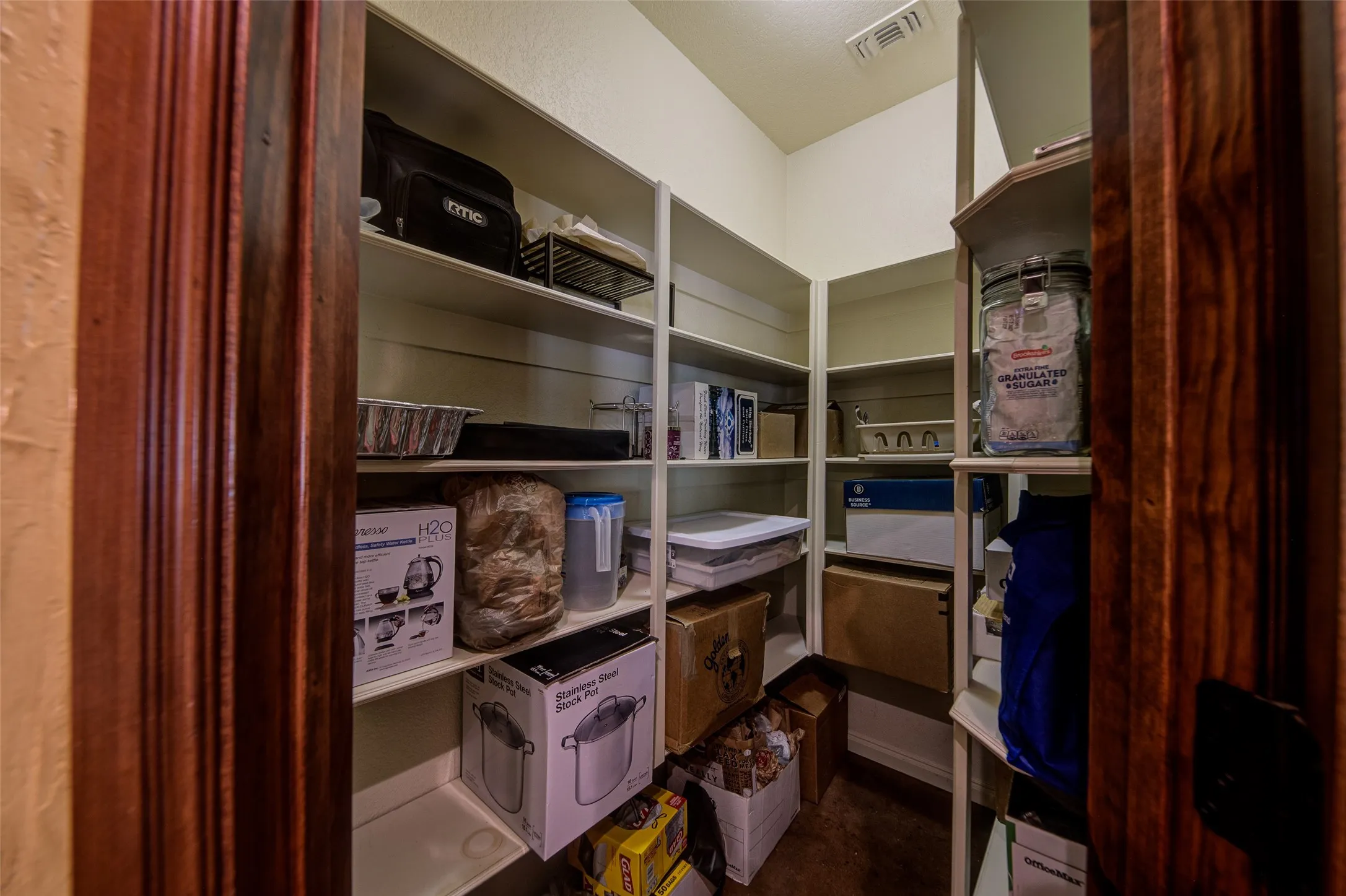 Walk-in Pantry with lots of shelving