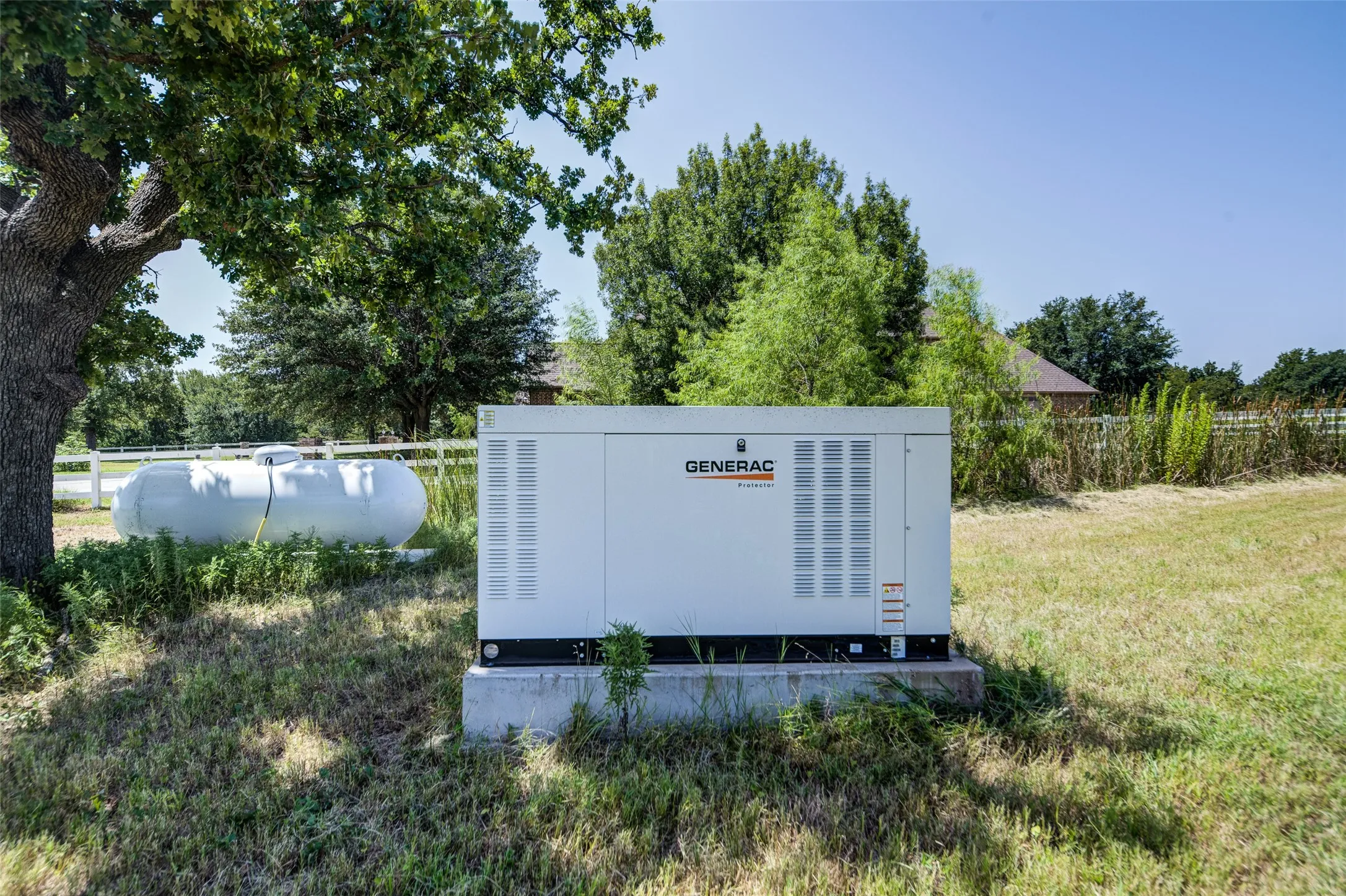 Generac standby generator on a concrete pad