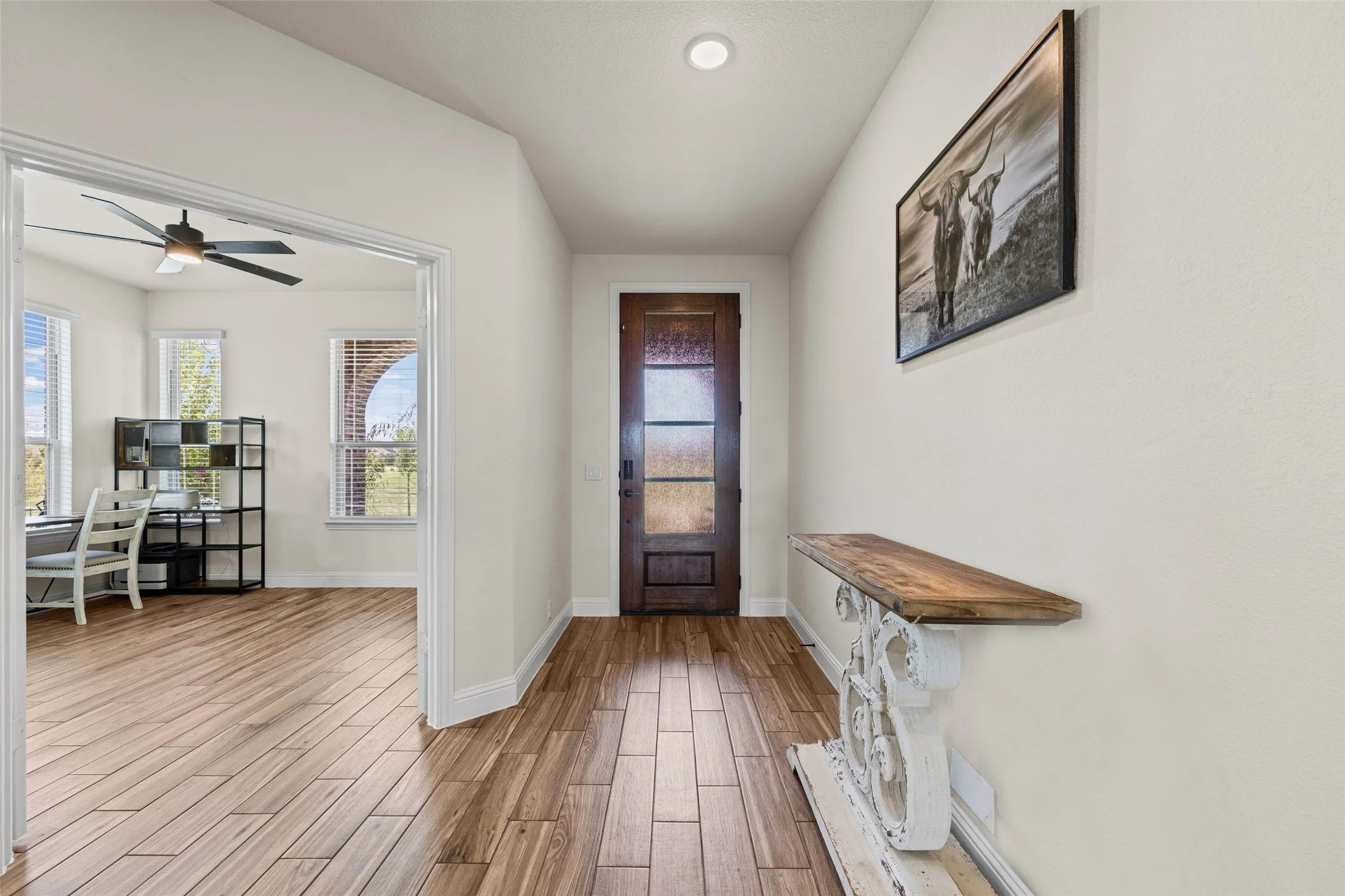 View of the front door and office at the front of the home