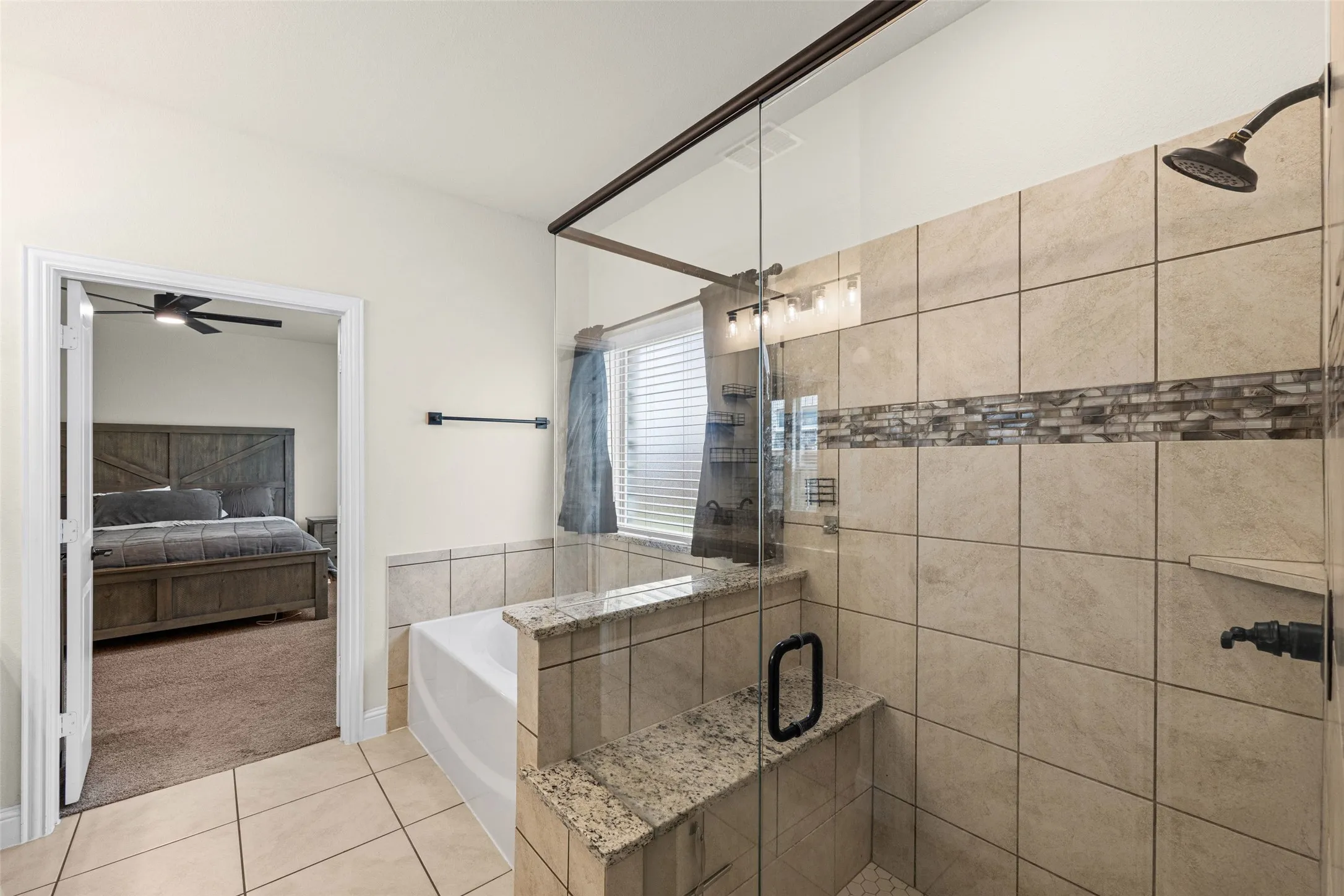 Primary bathroom has separate tub and shower and double sinks