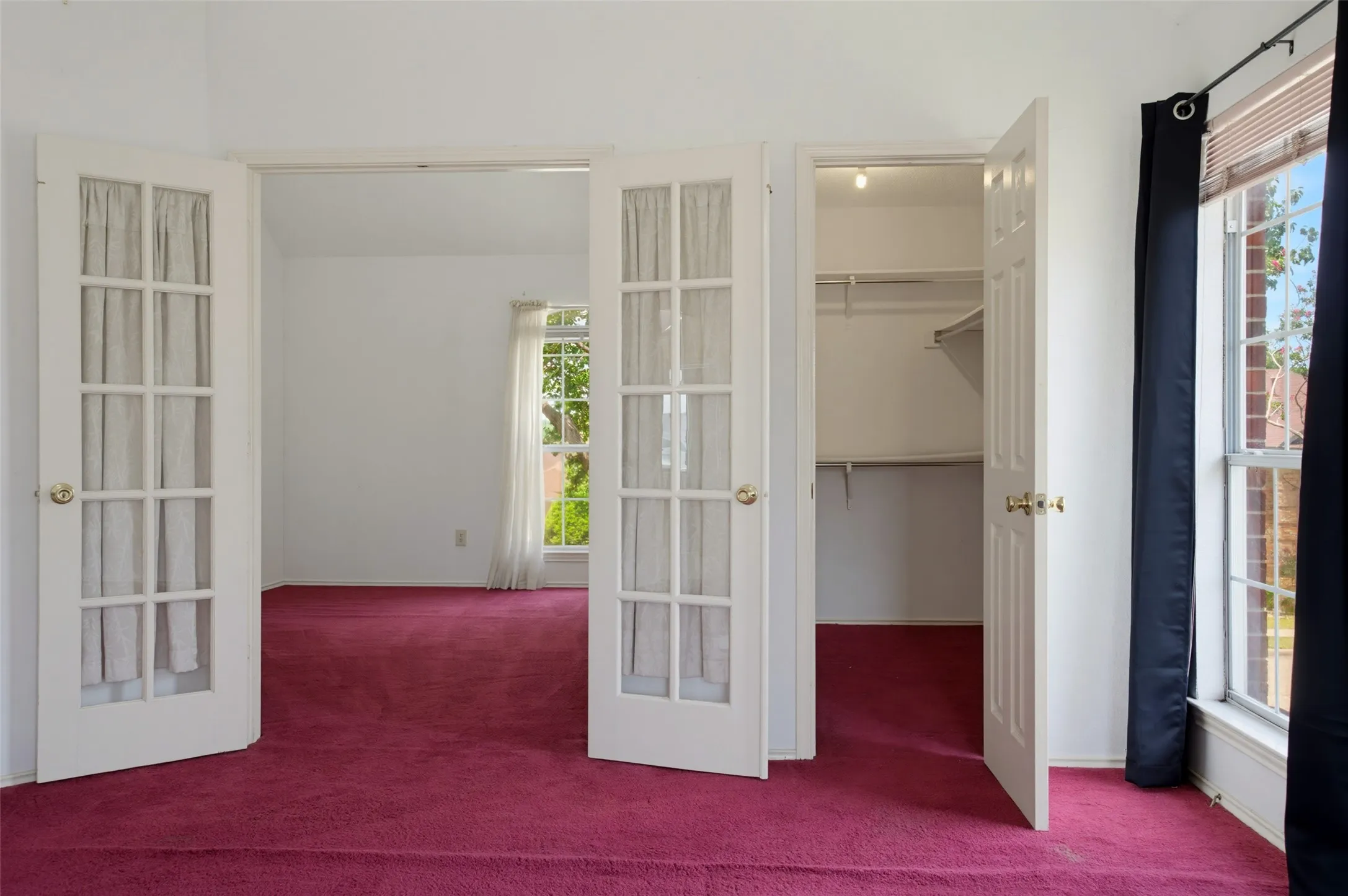 Here's a surprise! The original owner converted the 4th bedroom to an adjoined bedroom from the Prrimary. The current sellers liked it & kept it as is. During Covid she used it as her office & never went back. It would be very easy to convert it back to the entry from the hall.  The hall closet is the original entry. The lightswitch is still just inside the hallway door. That room has a great walk-in closet to the right of the window.