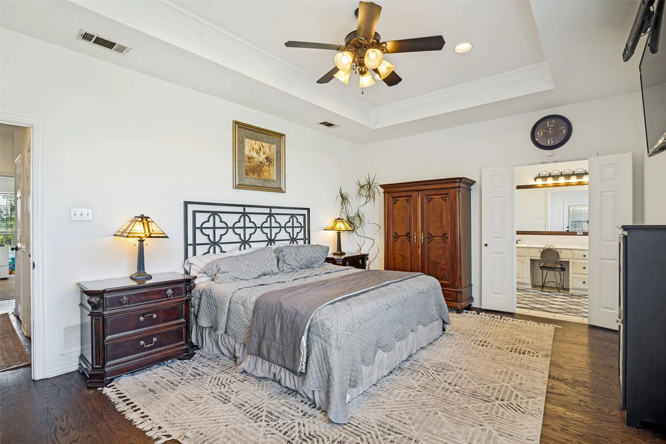 Large room, tray ceiling and also has access to the back patio.