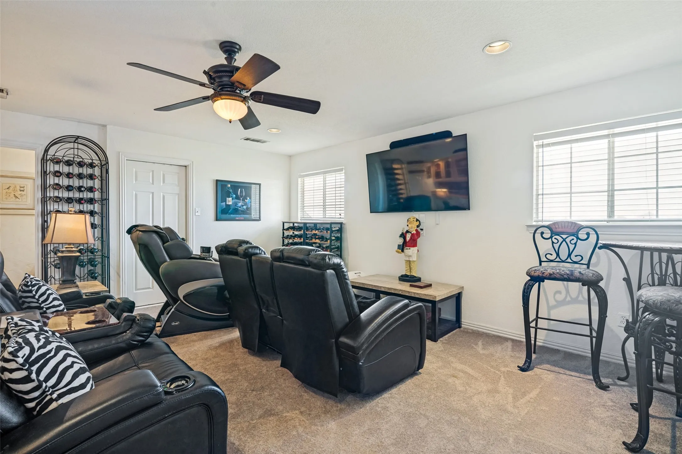 The perfect space to watch movies or turn this into a game room.  It also makes the perfect exercise room, craft room or homeschool space.  So many option for this bonus space!