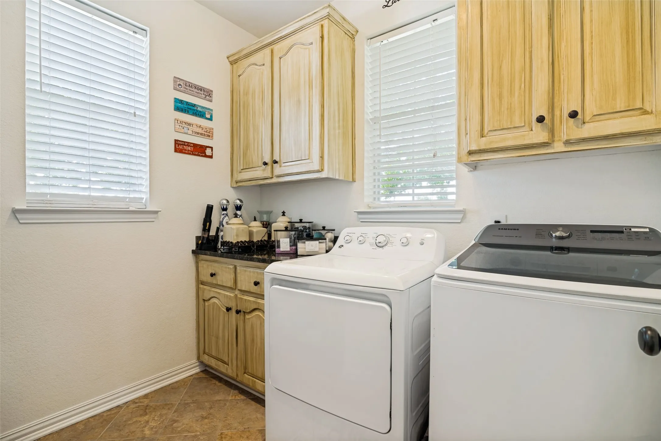 Utility room has lots of storage and is very spacious.