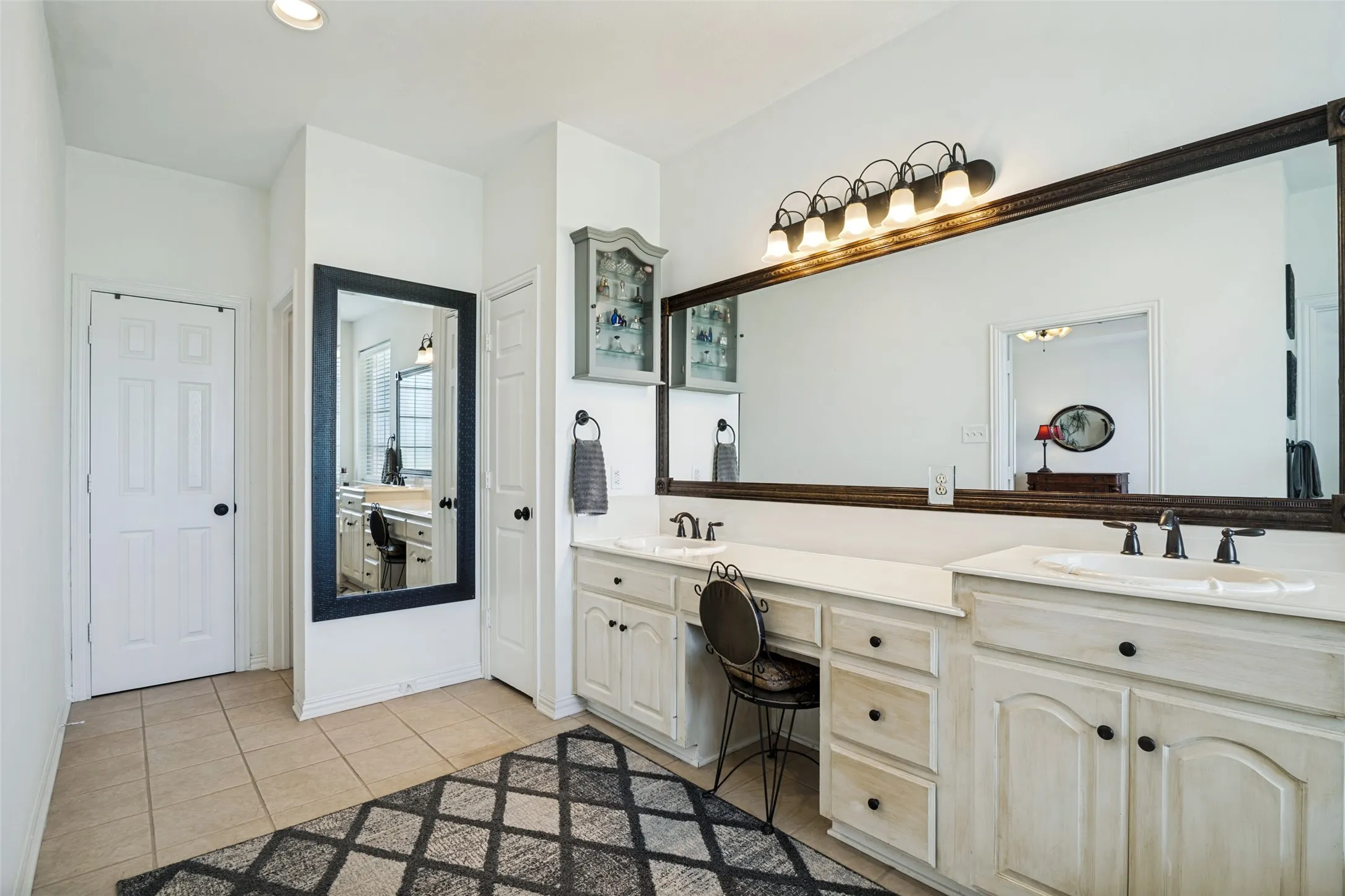 Primary bathroom with double sinks and lots of counter space.