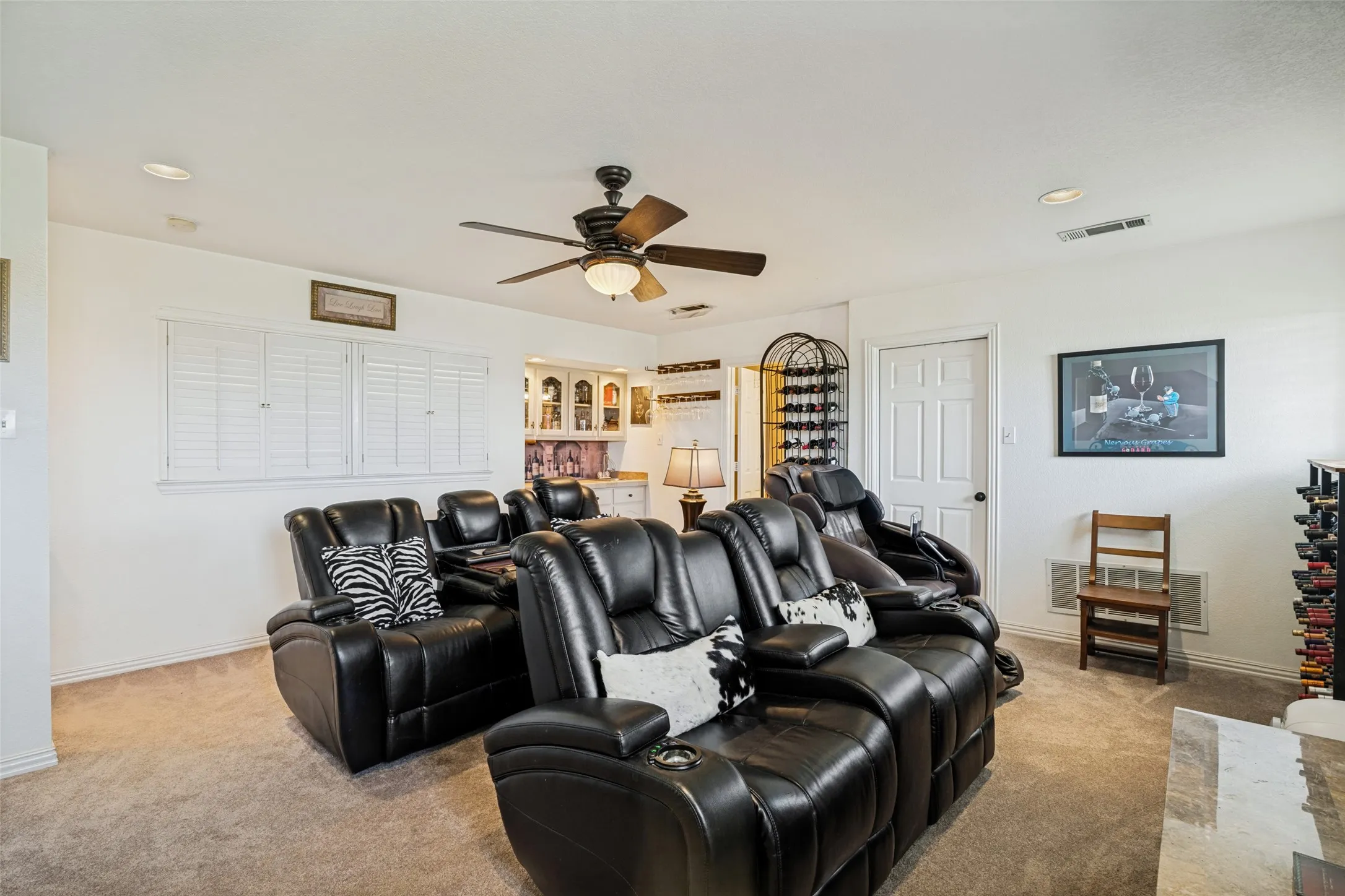 Upstairs is just this one room and half bathroom plus a wet bar.