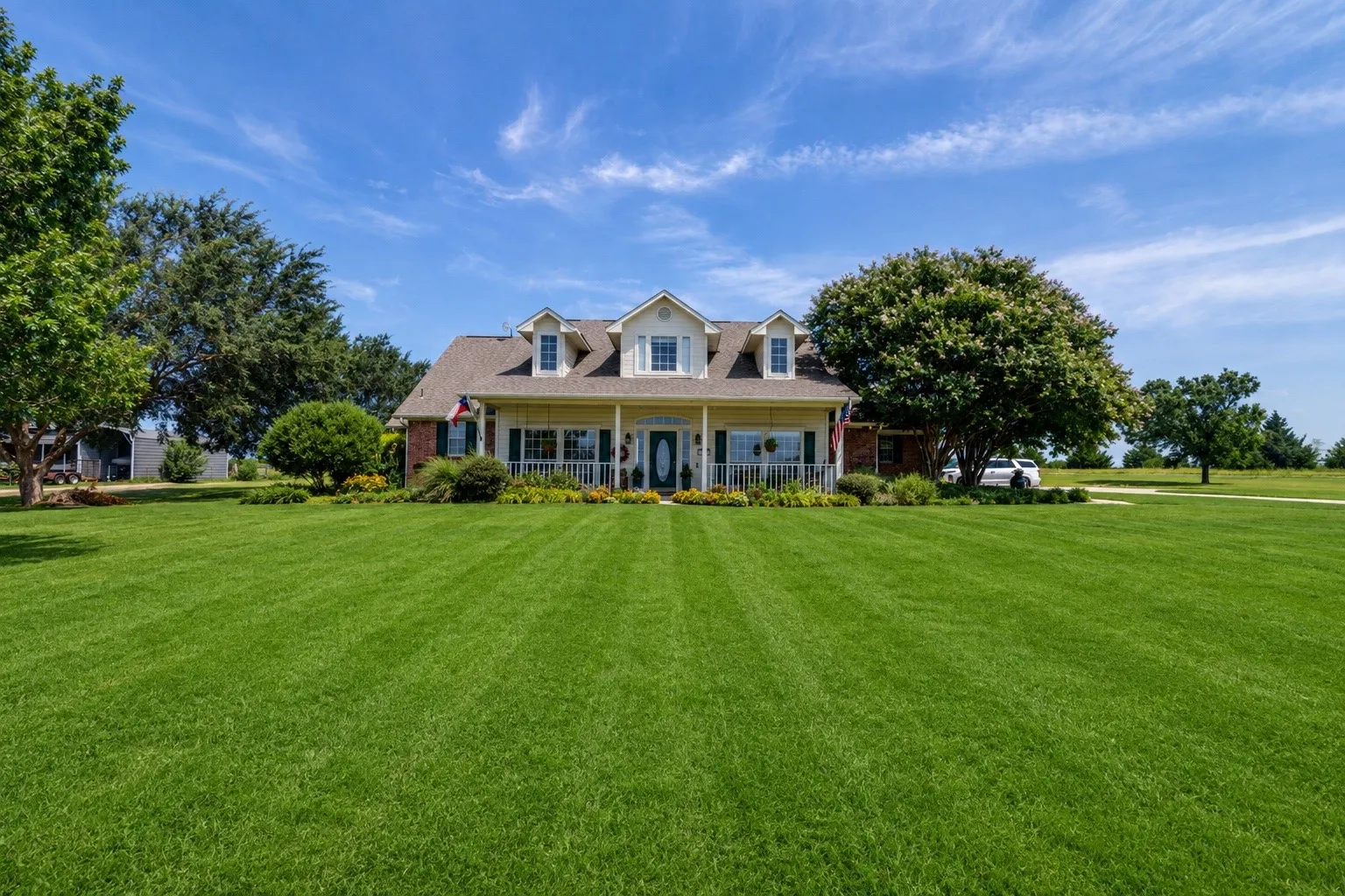 Set far off the main road this home has a stunning look and traditional feel with amazing front porch.