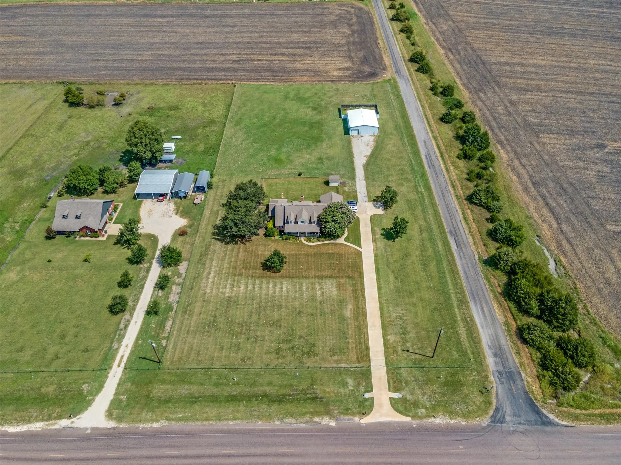 Corner property. Field behind property is also for sale. Sold separately.