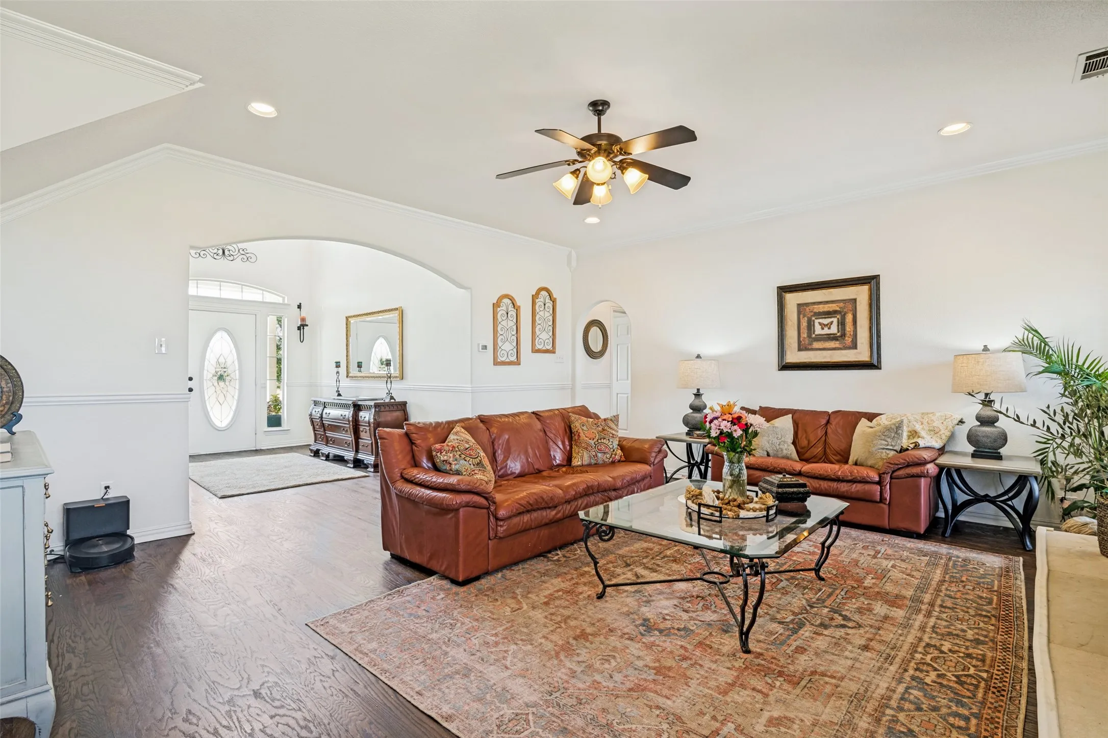 View from the eat in kitchen area looking into the family room and towards the front entry.
