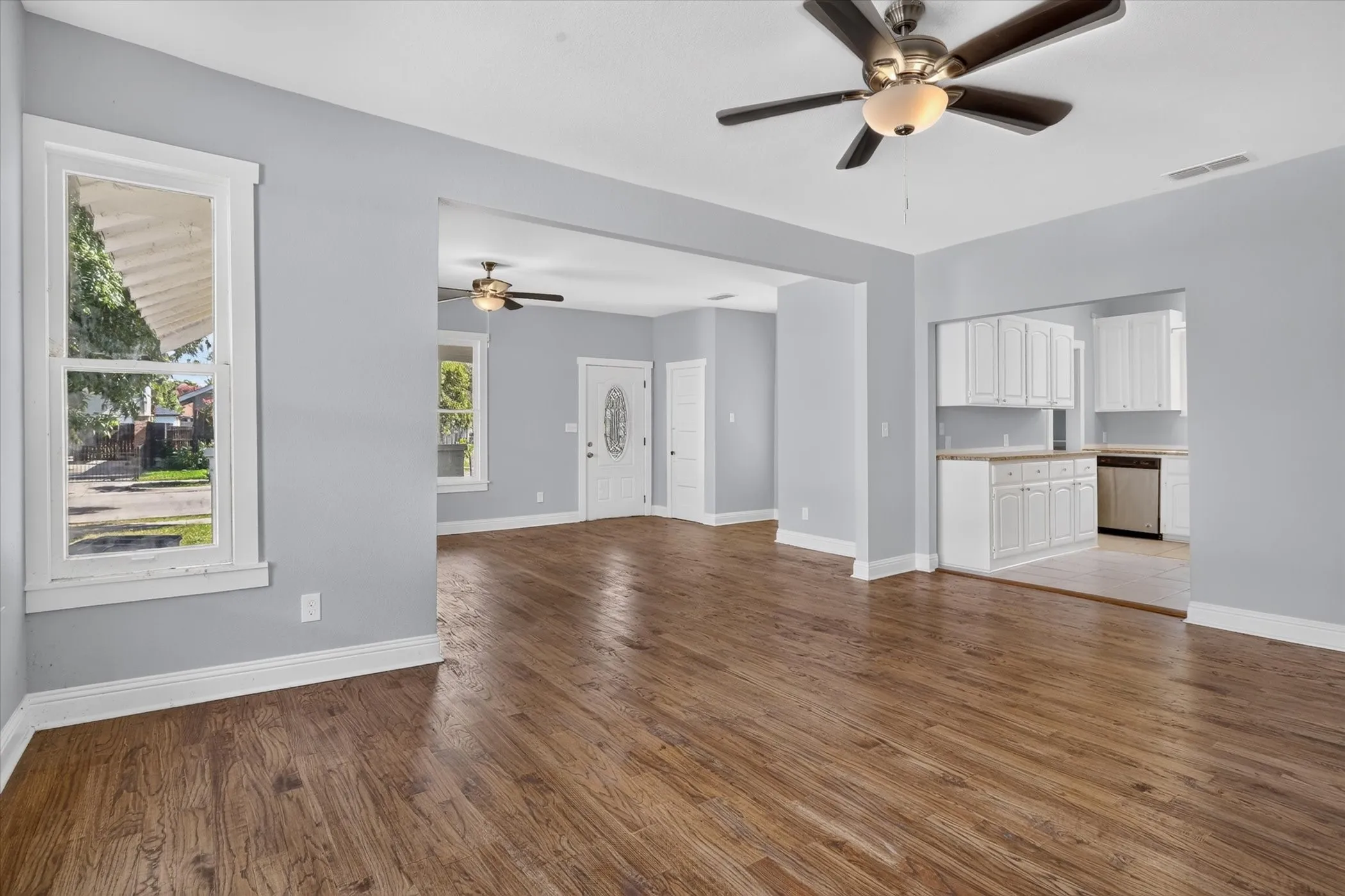 Spacious interior featuring wood-finish flooring throughout