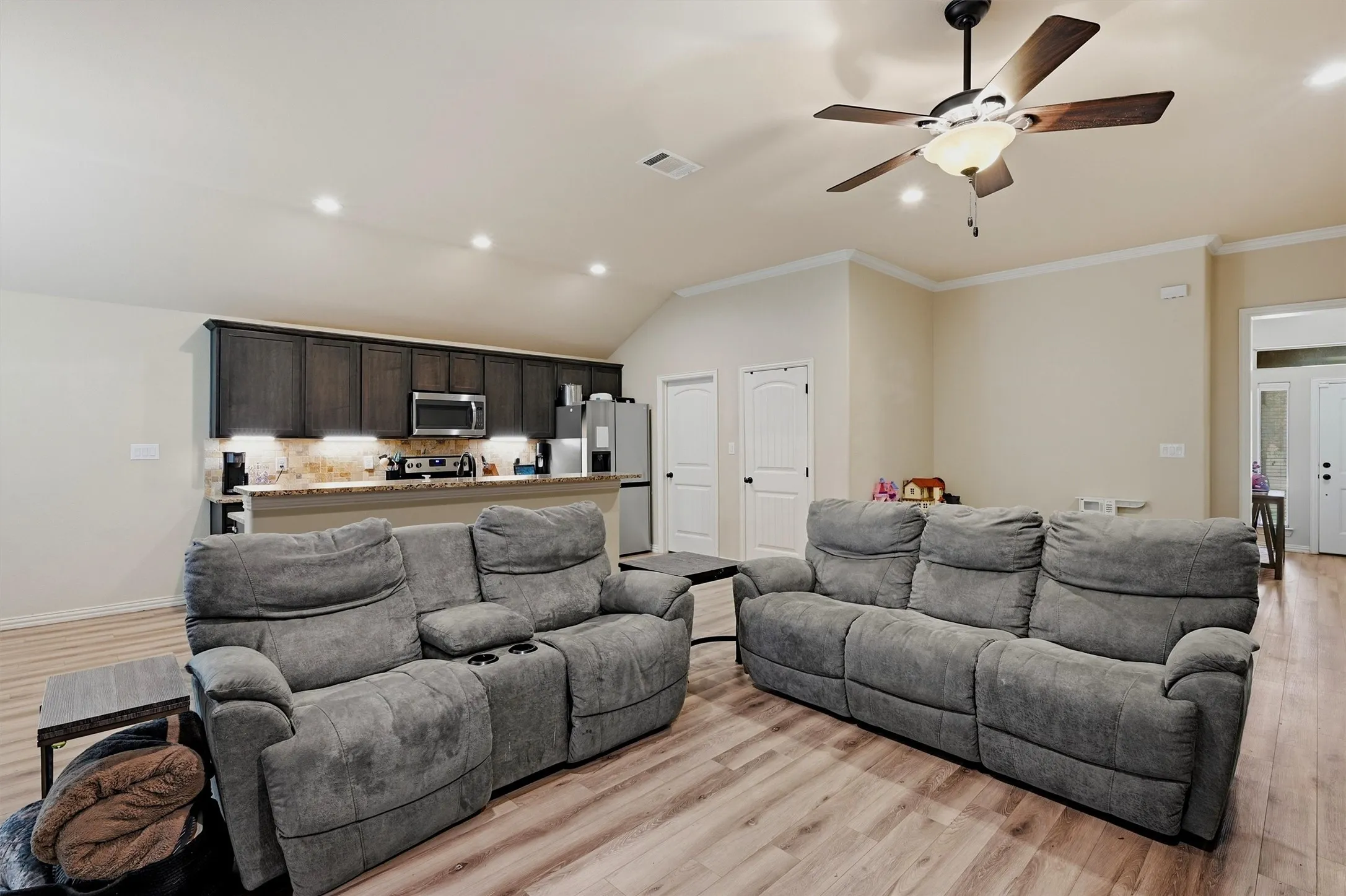 You can push the couches back for more space or bring them in to get cozy for movie night.
