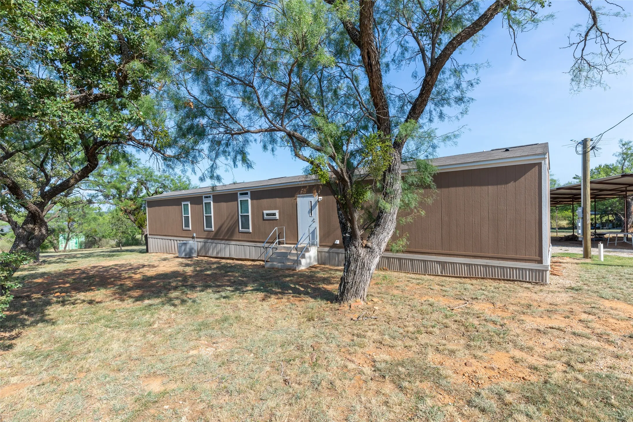 Manufactured Home For Sale in Stephens County , 6801 County Road 304, Breckenridge, Texas 76424, 3 Bedrooms, 2 Bathrooms, Garage spaces, 1,216 Sqft, built in 2021, Price $274,900, mls#21334083, Real Estate Agent in Breckenridge, Homes For Sale in Stephens county, Homes For Sale in Breckenridge, Realtor in Breckenridge Texas, Real Estate Brokerage Independent Realty Texas, Luminita Cordes Realtor