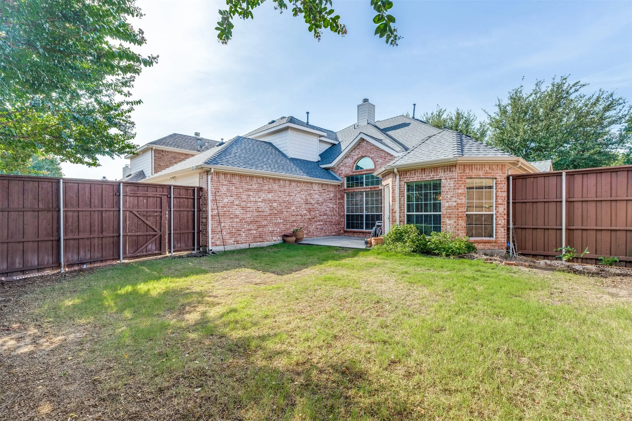 Private fenced backyard