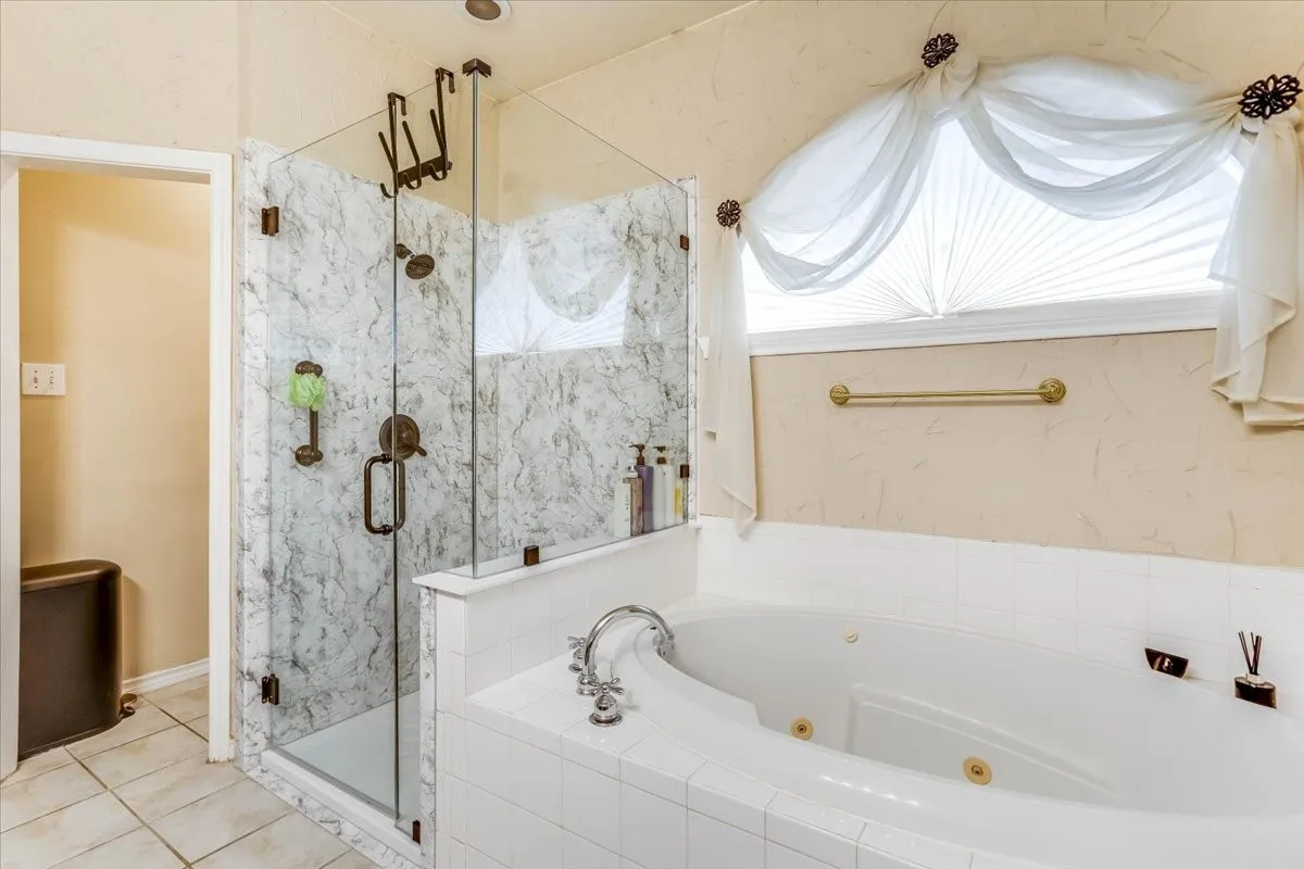 Soaking tub with integrated jets and chrome fixtures