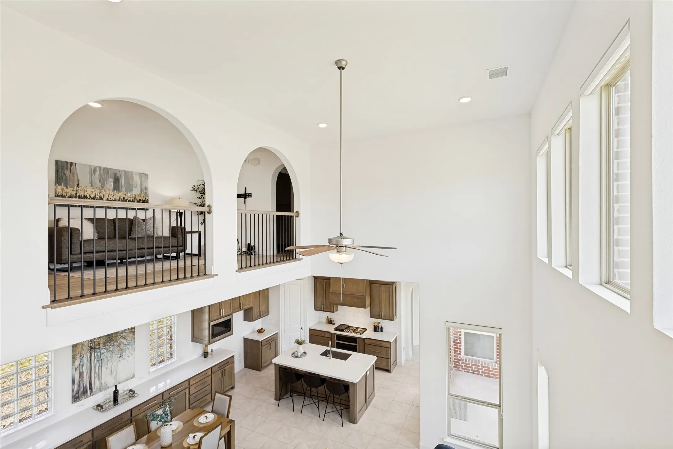 View from the second floor providing the open concept layout on the main floor.