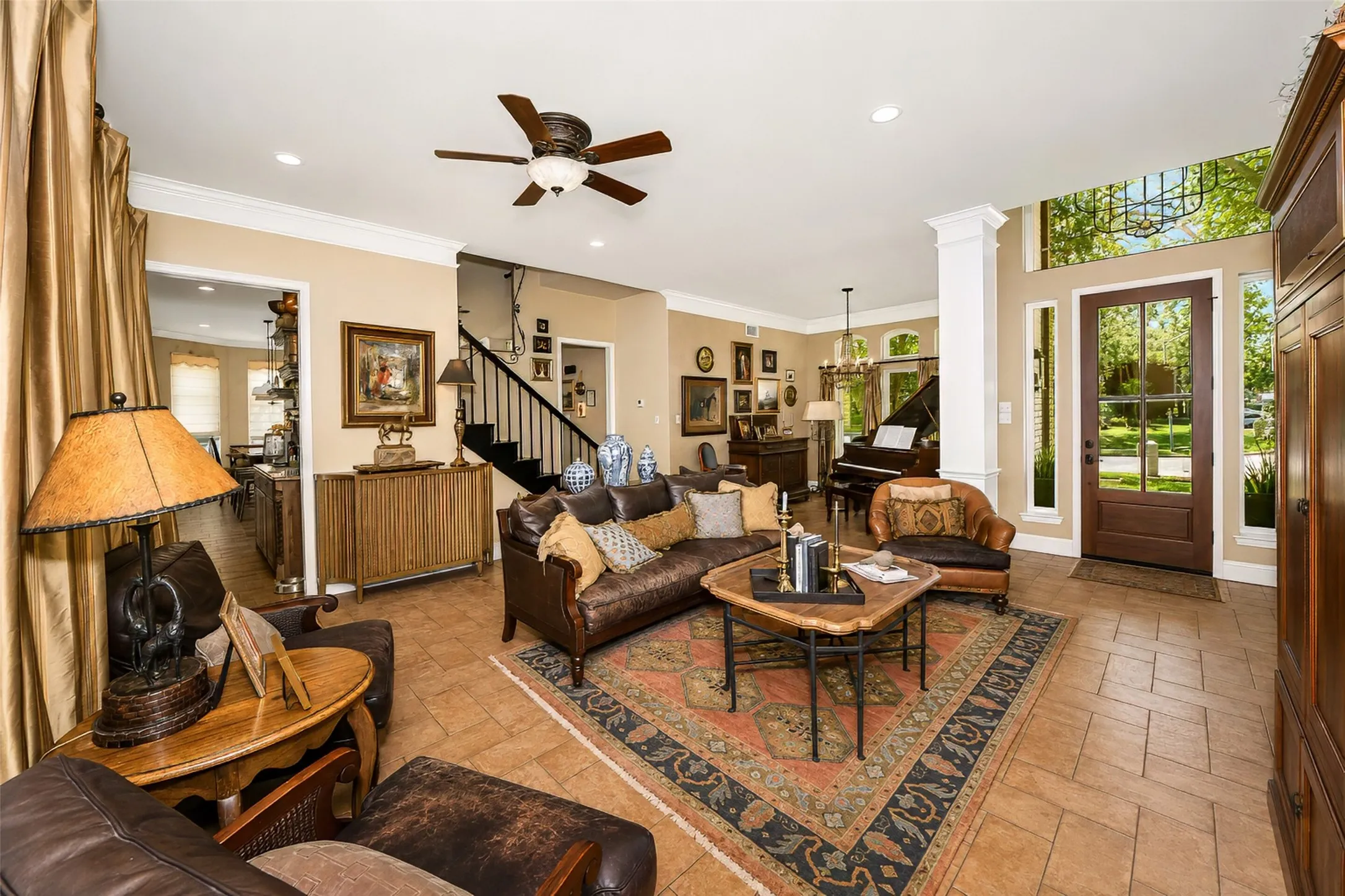 Herringbone tile flooring and tall ceilings with crown molding are some of the special touches to be found here.