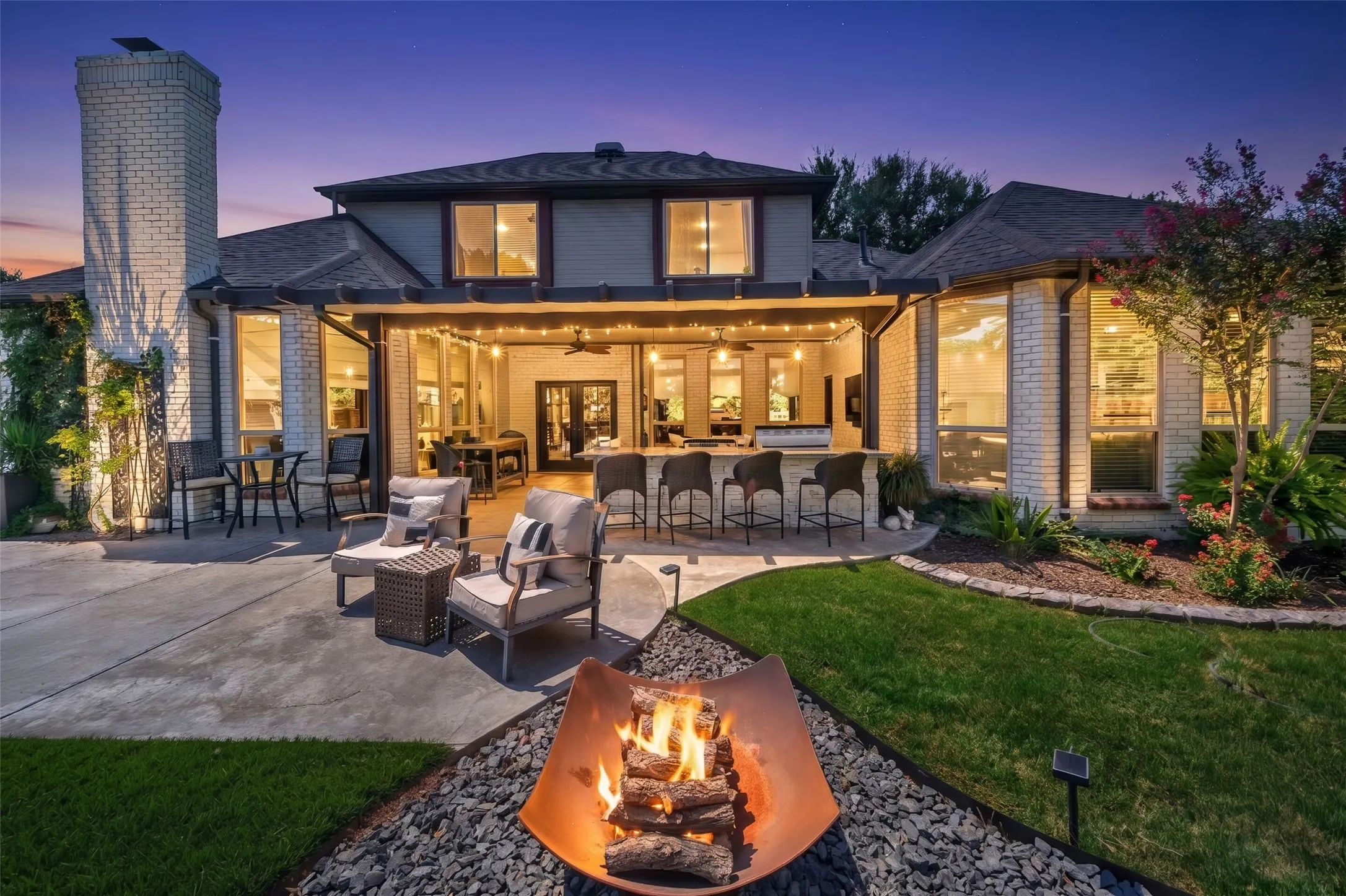 Enjoy evenings year round at this expansive property!