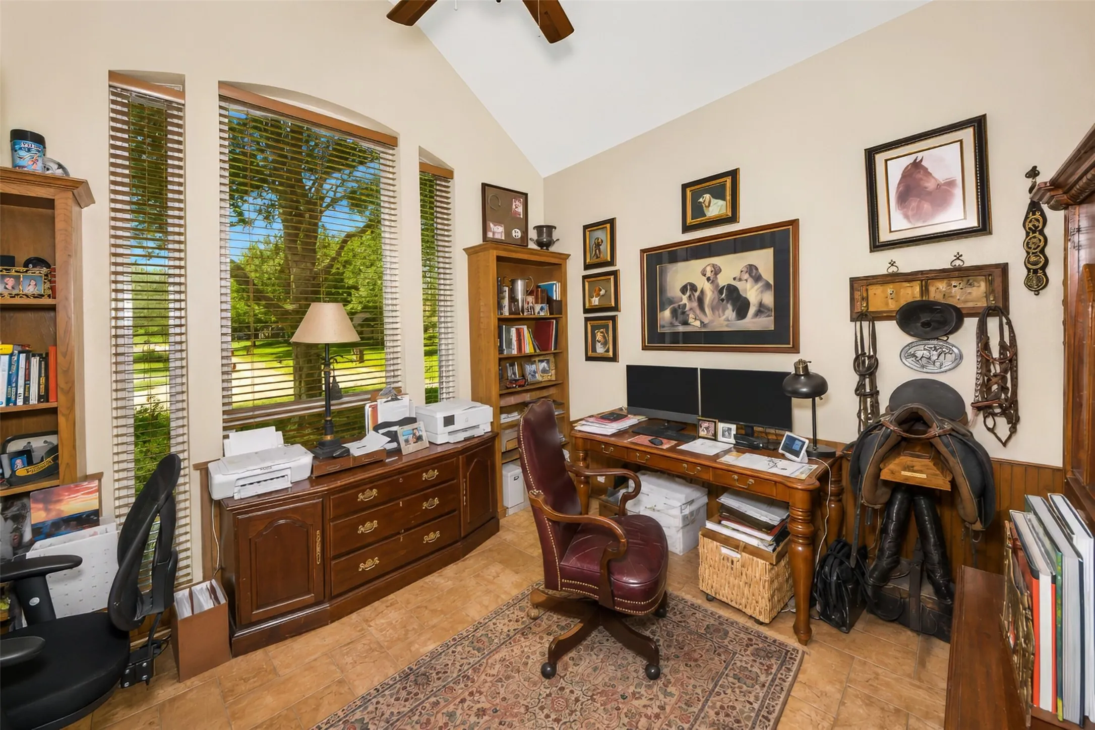4th bedroom is currently used as a study, and features a large walk in closet and vaulted ceiling with expansive windows.