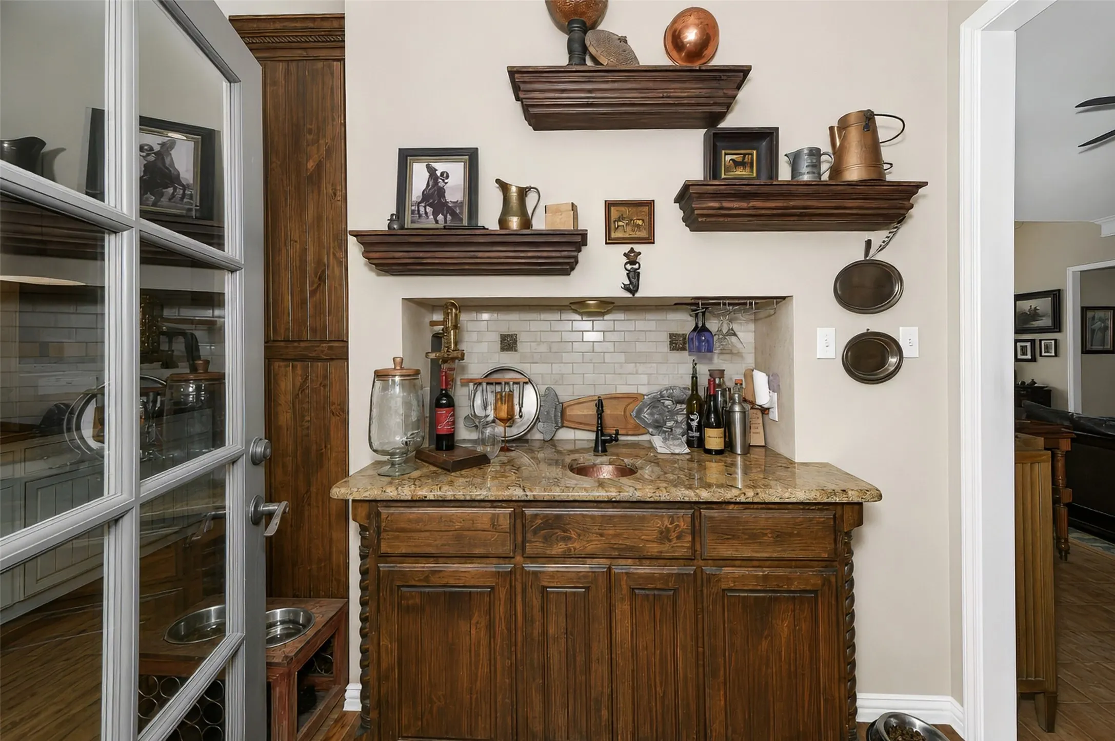 Entertain easily with a wet bar located between family room and formal living areas.