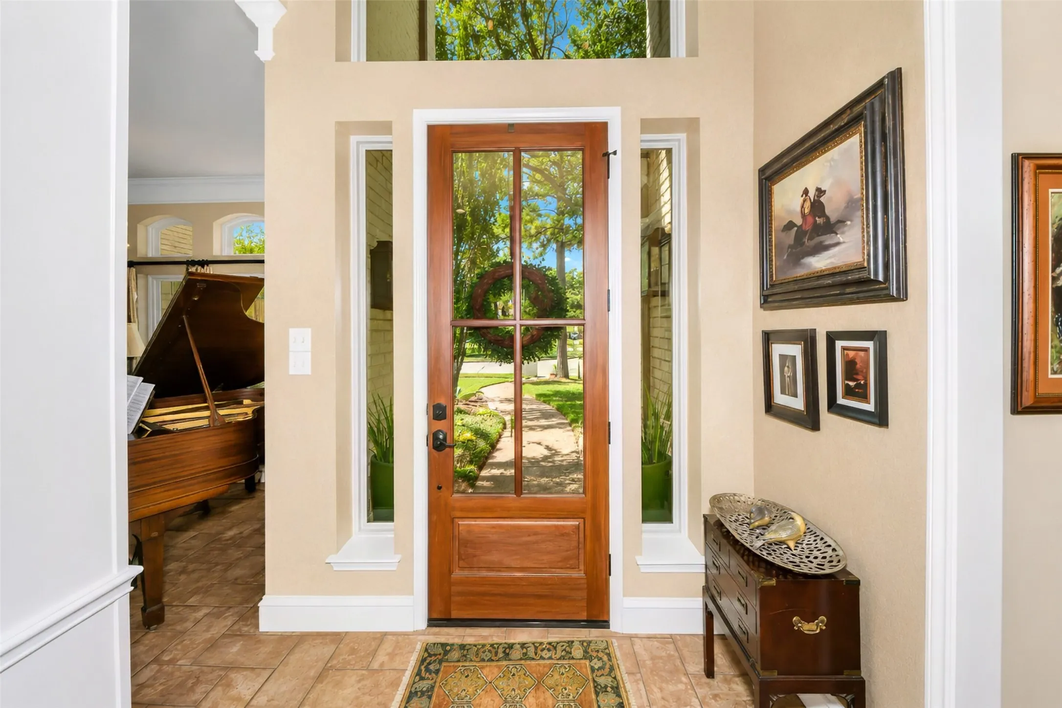 New mahogany front door with beveled glass.