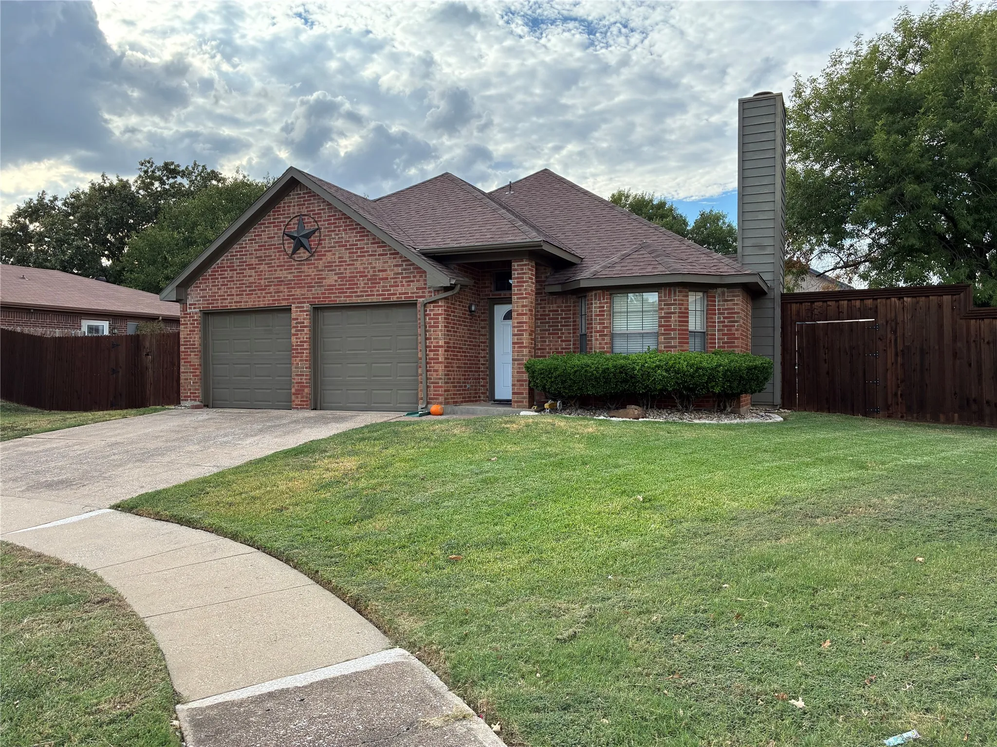 Brick exterior with a two-car garage