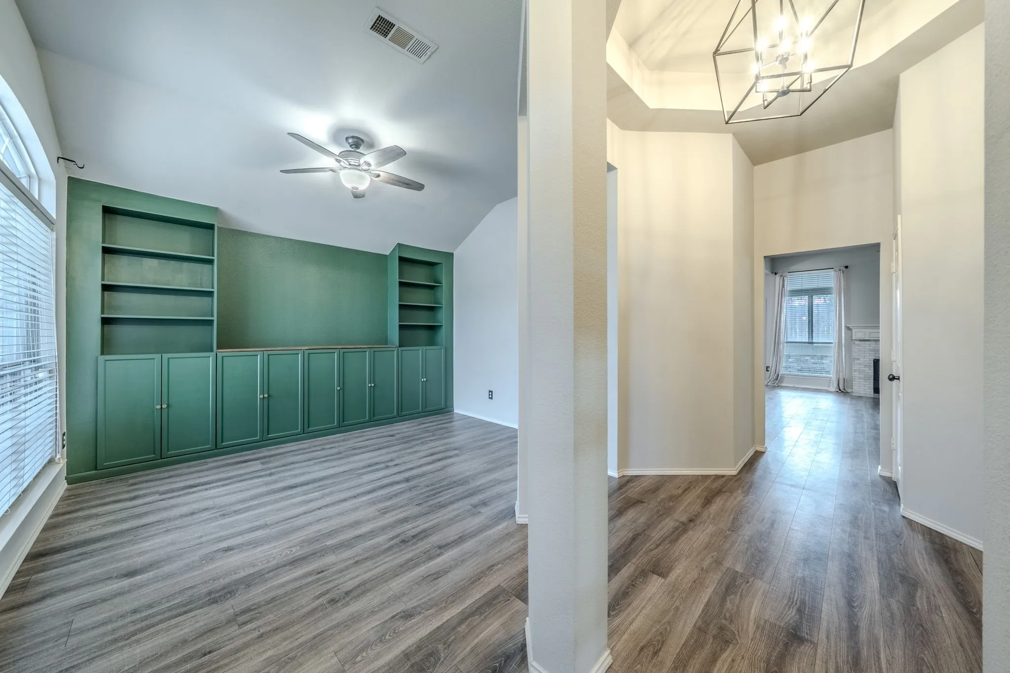 Custom shelving accents the formal dining room