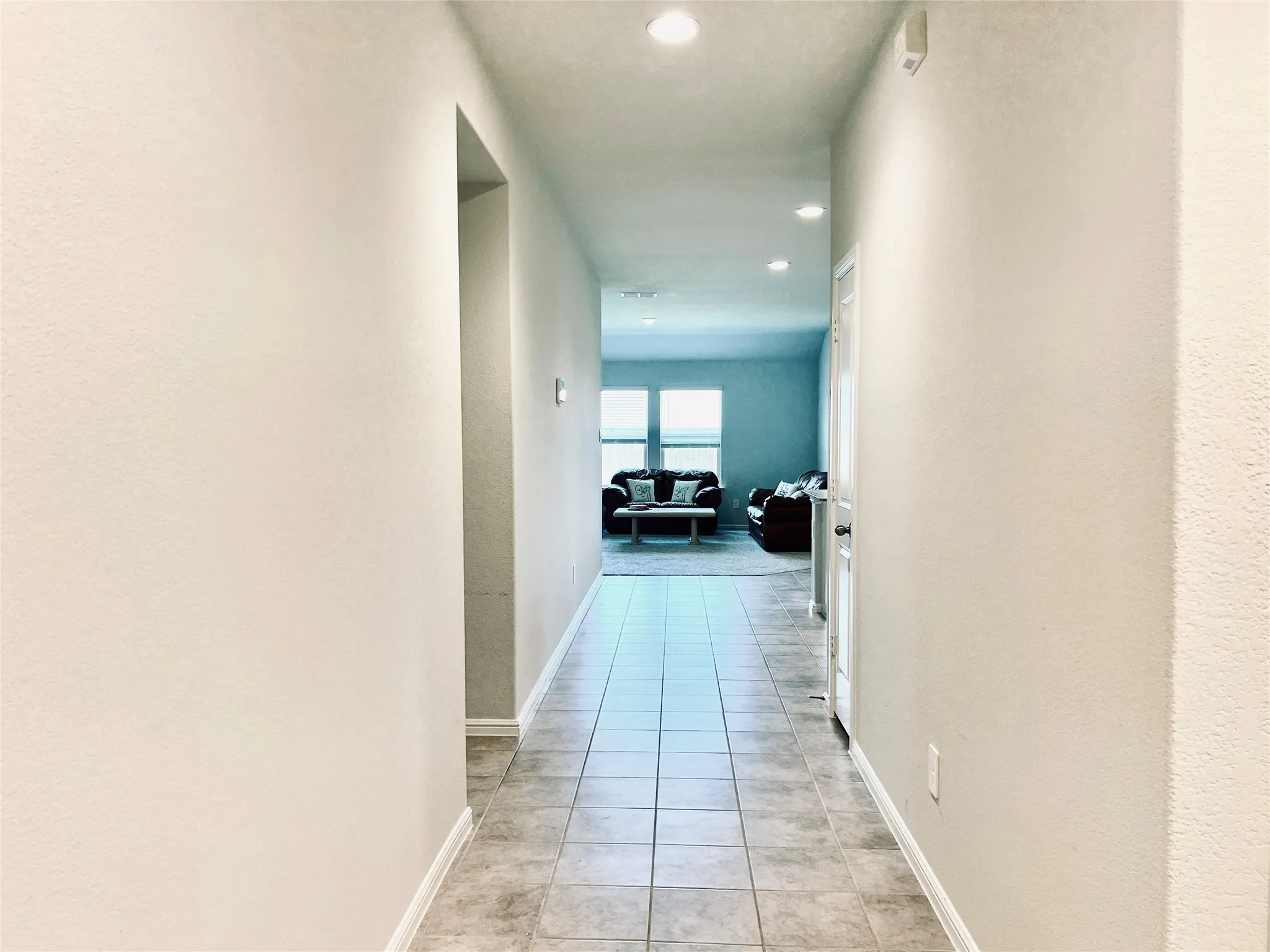view of hallway from the entrance door