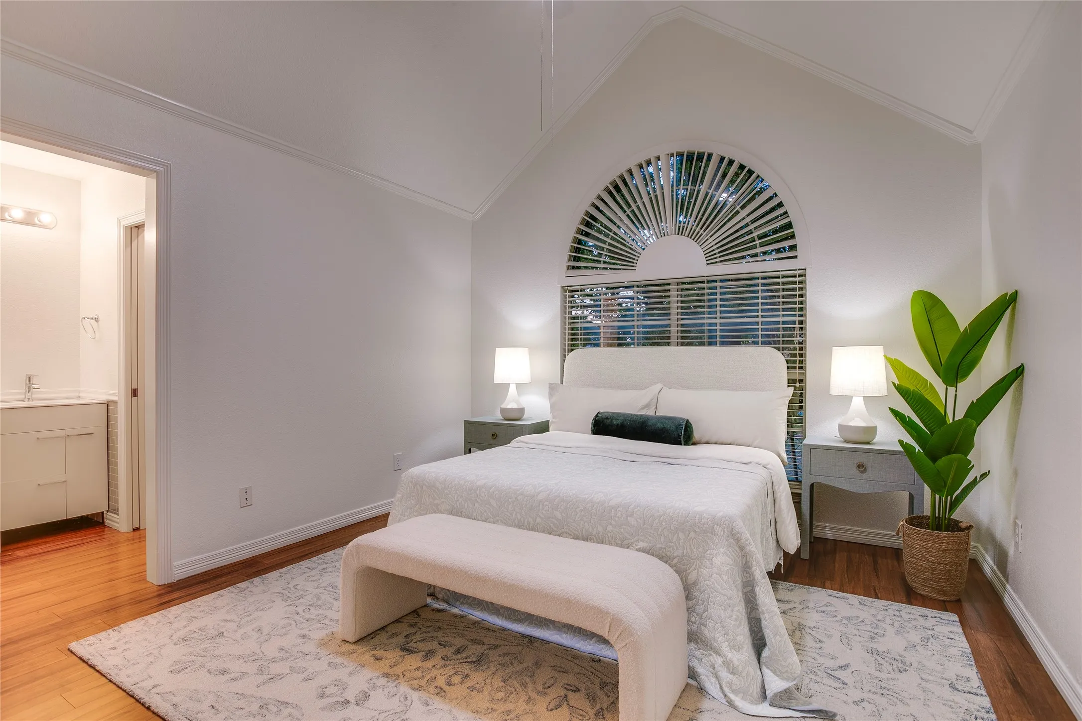 Bedroom #4 upstairs with a tree top view overlooking the front streetscape below.