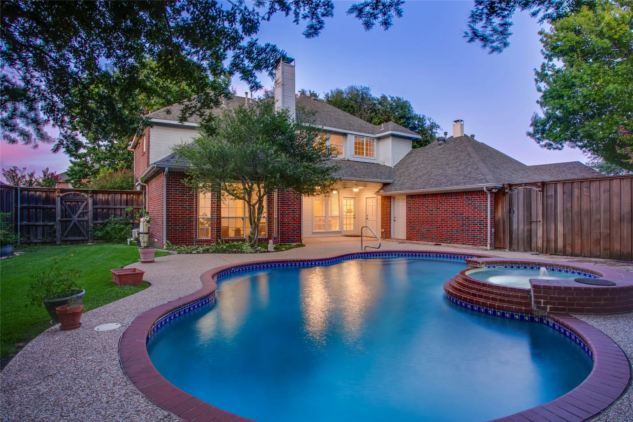 The exterior door to the right of the rear french door leads to a full bath which is convenient for pool users.