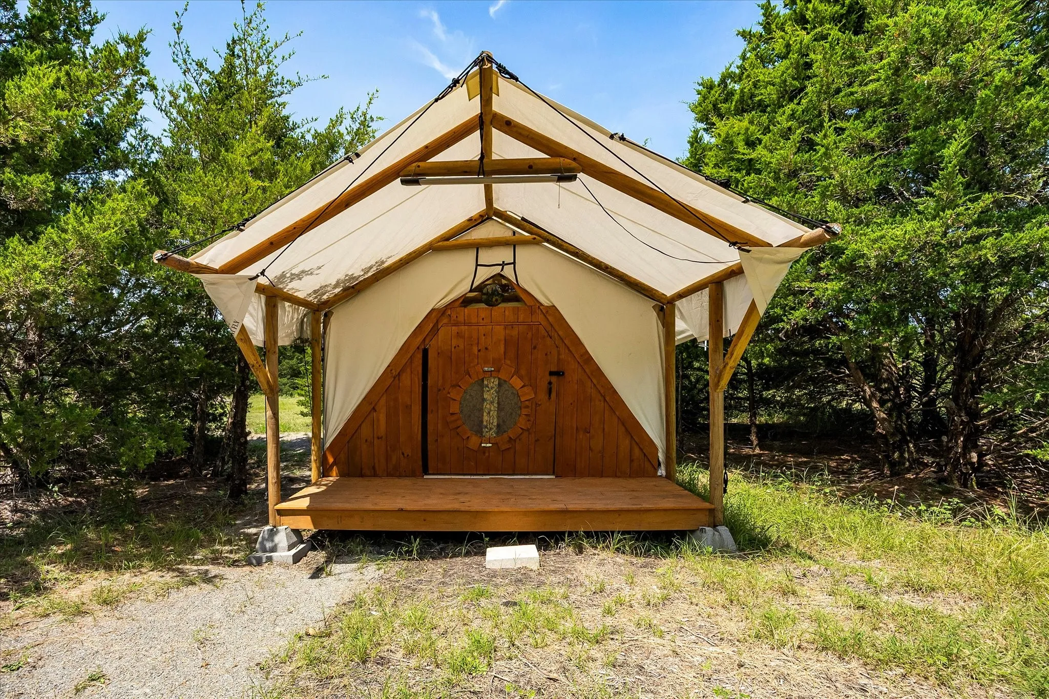The Bluebonnet - Glamping tent with covered porch.
